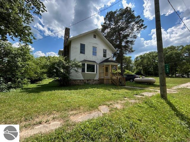 145 Millbrook Road, Blanchard, MI 49310 — front exterior