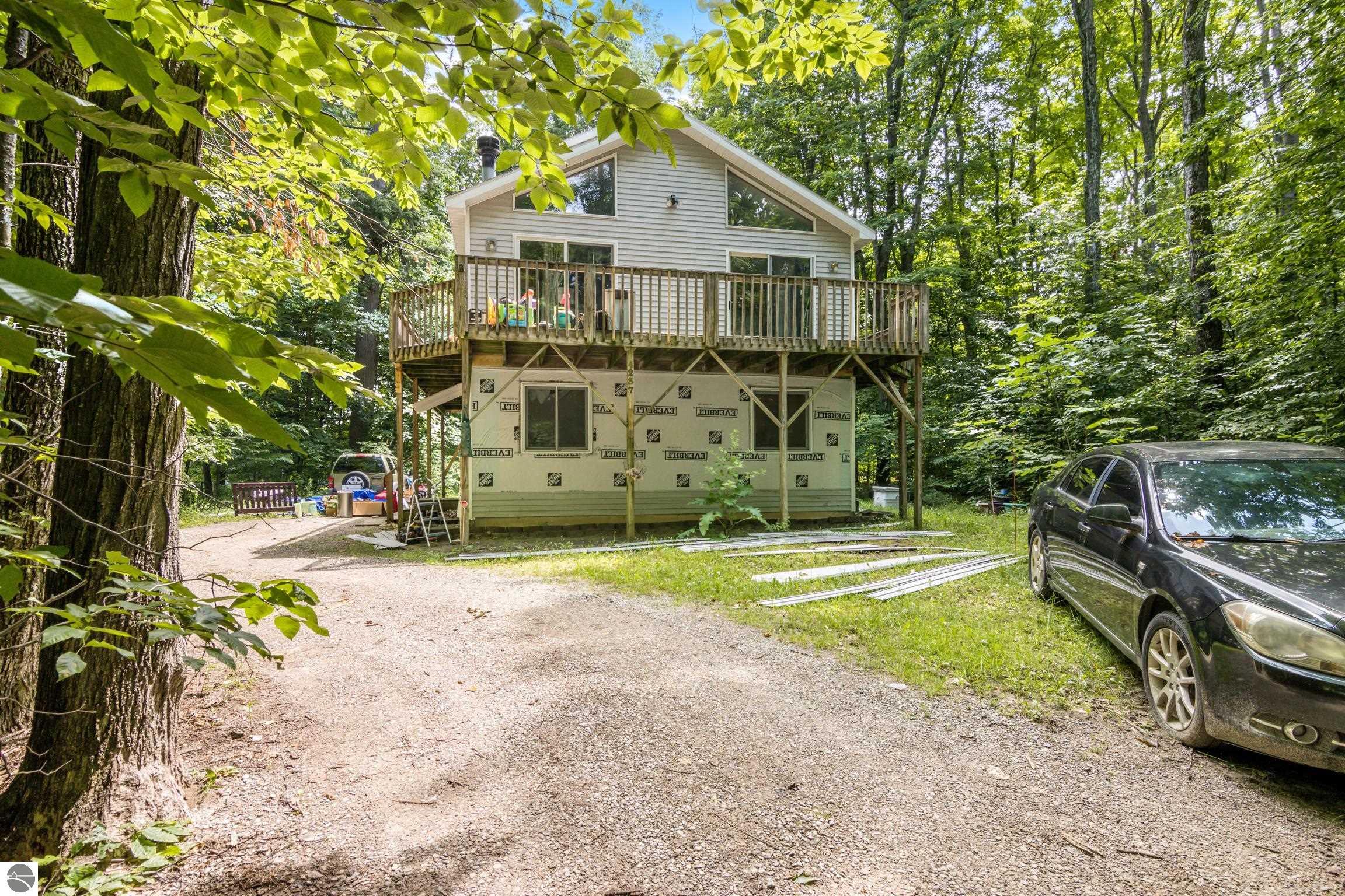4237 S Hemlock Road, Cedar, MI 49621 — front exterior