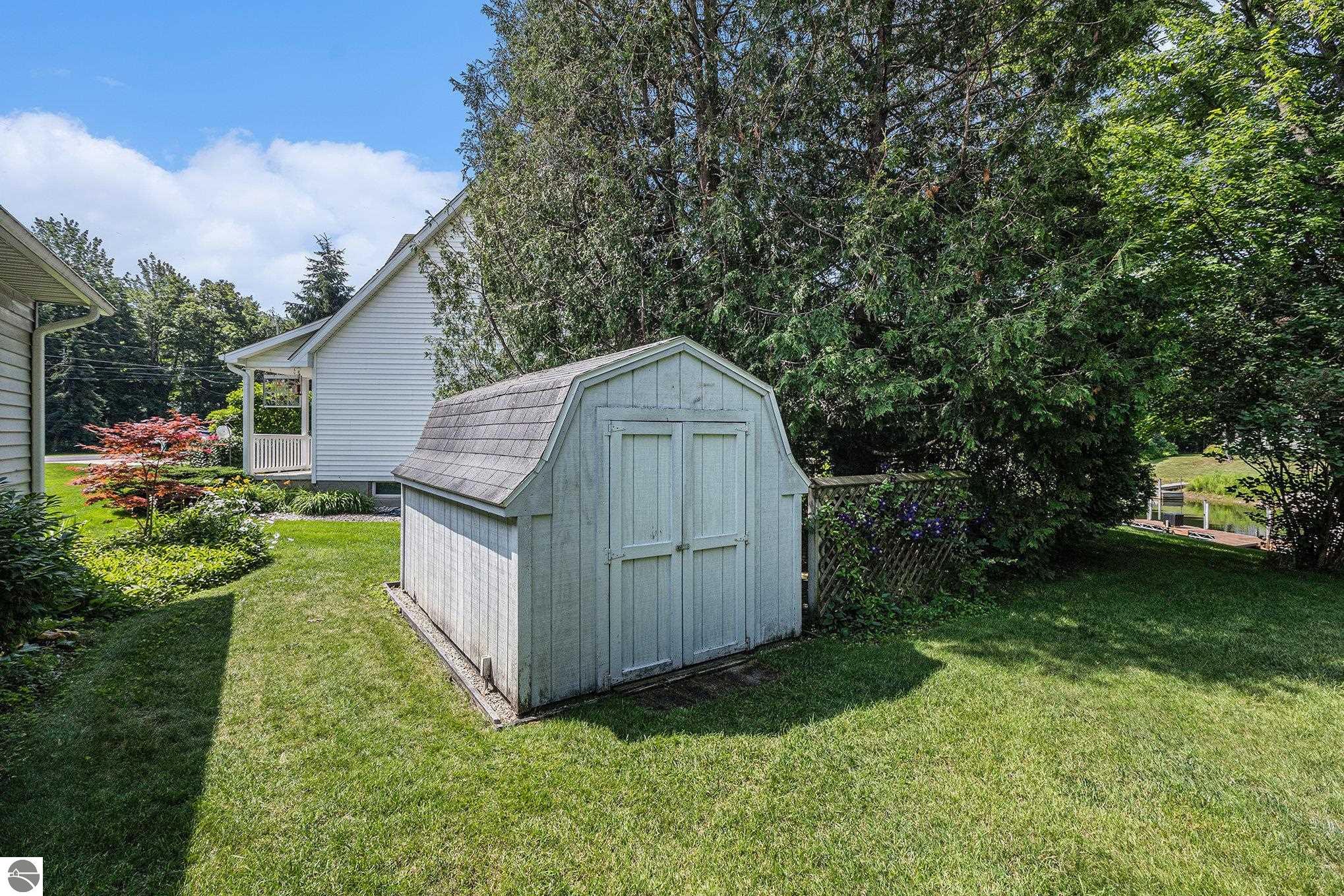 6860 E Harbor Drive, Elk Rapids, MI 49629 — Photo 24