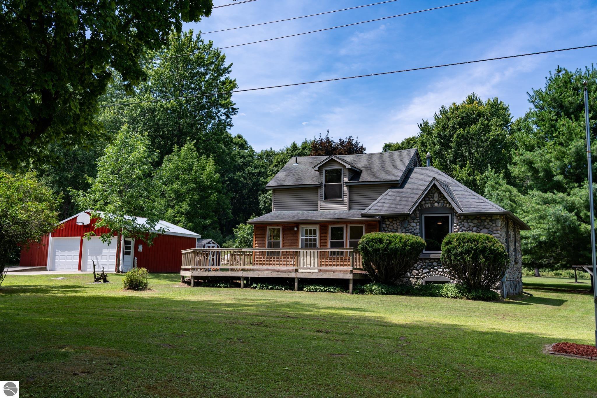 731 N Rolland Road, Weidman, MI 48893 — front exterior