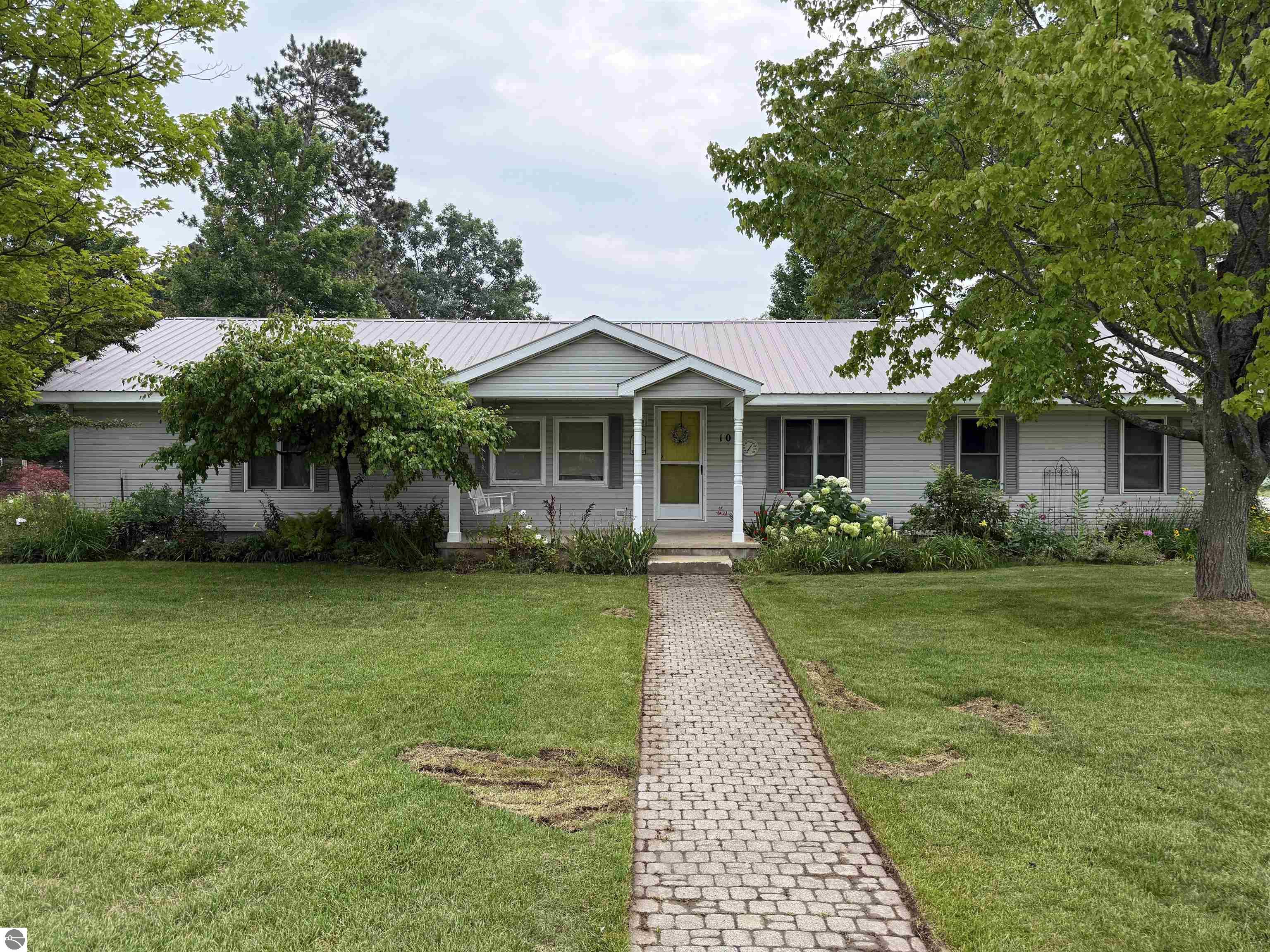 102 Paw Paw, Kalkaska, MI 49646 — front exterior