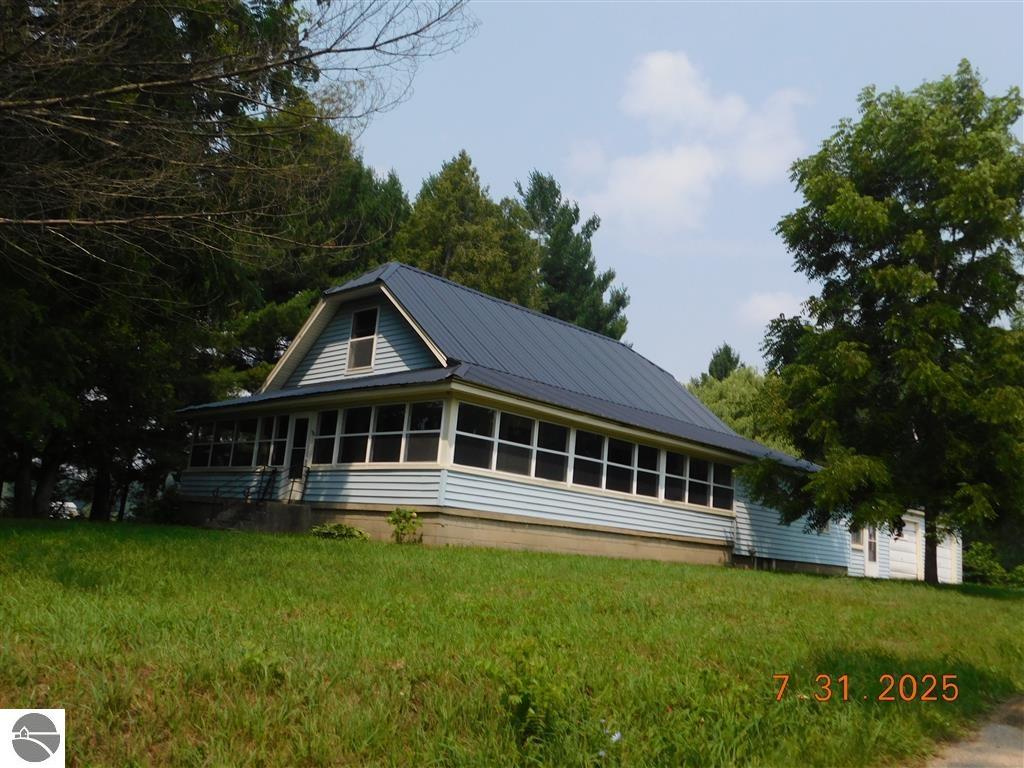 4524 20 Mile Road, Marion, MI 49665 — front exterior