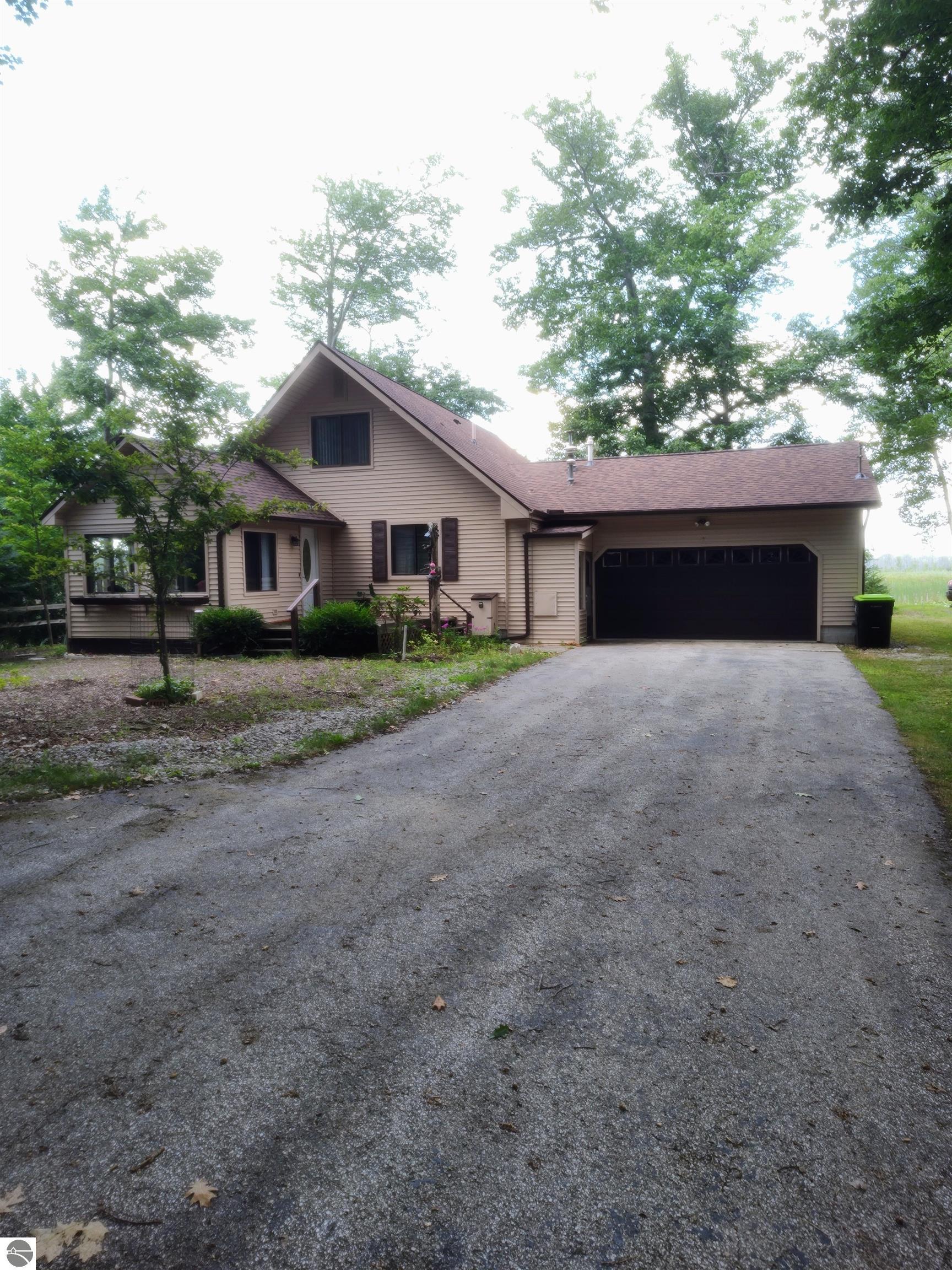 541 Rainbow Drive, East Tawas, MI 48730 — front exterior