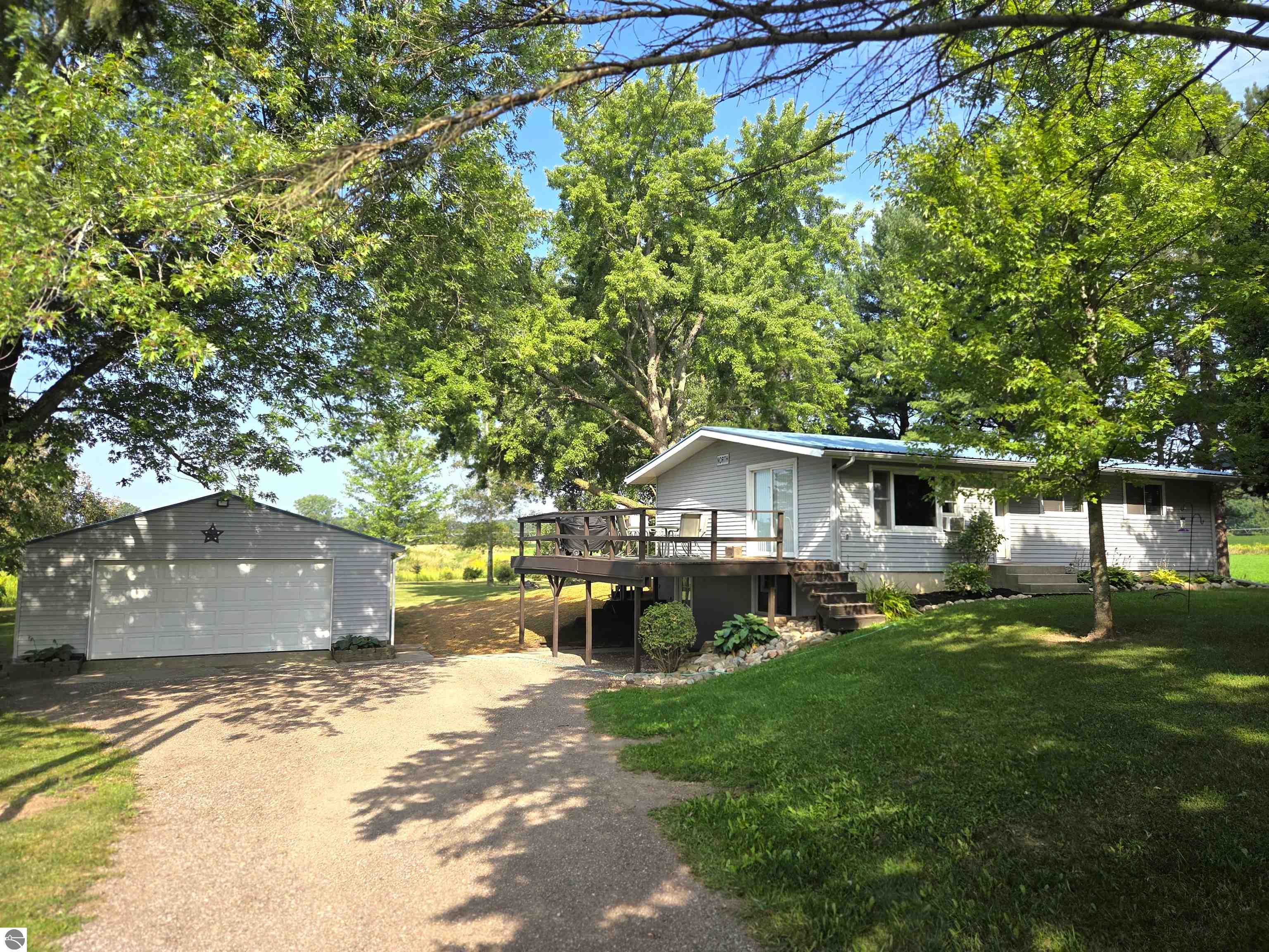 8803 Woodruff Road, Blanchard, MI 48858 — front exterior