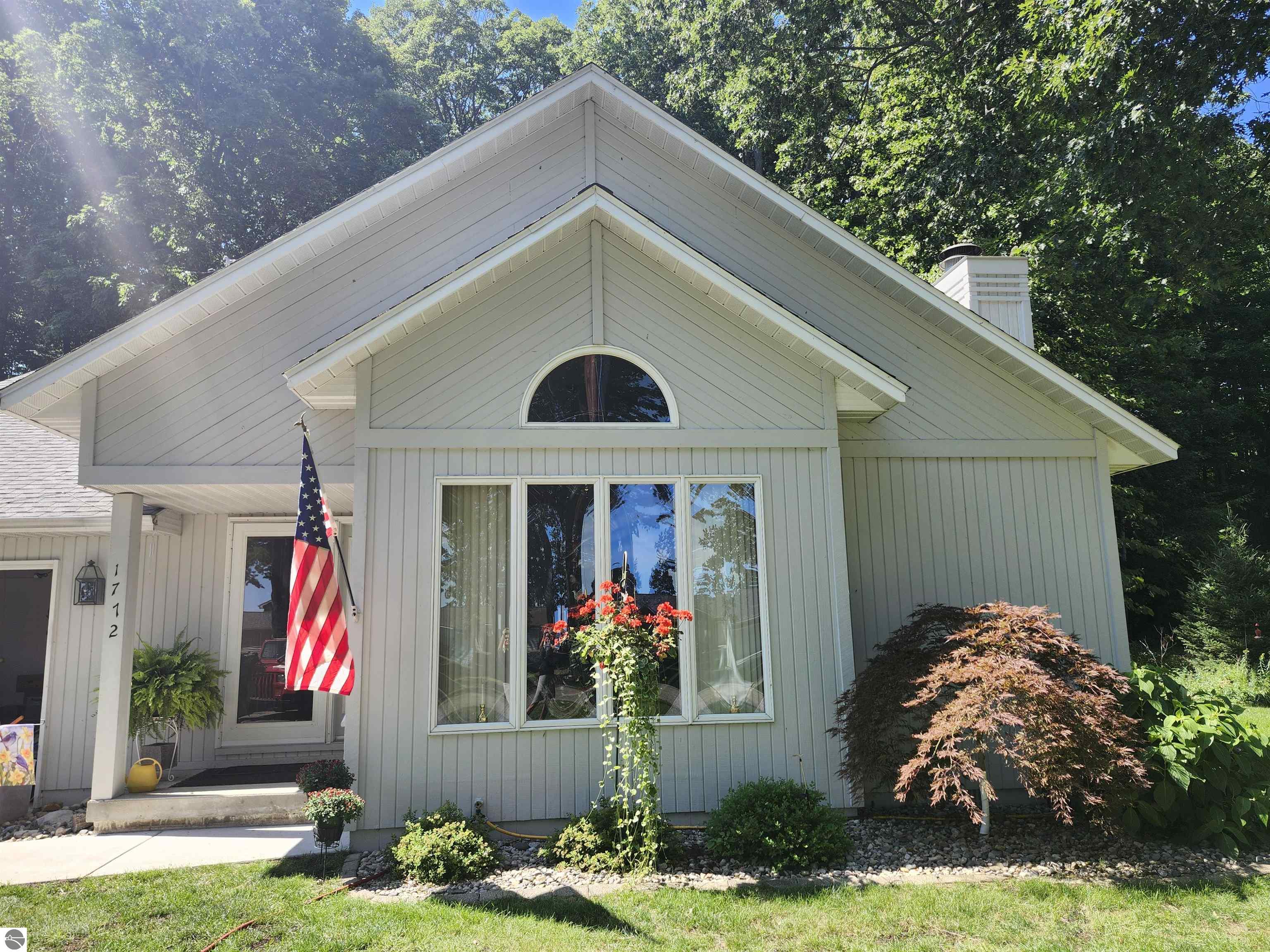 1772 Douglas Drive, Tawas City, MI 48763 — front exterior