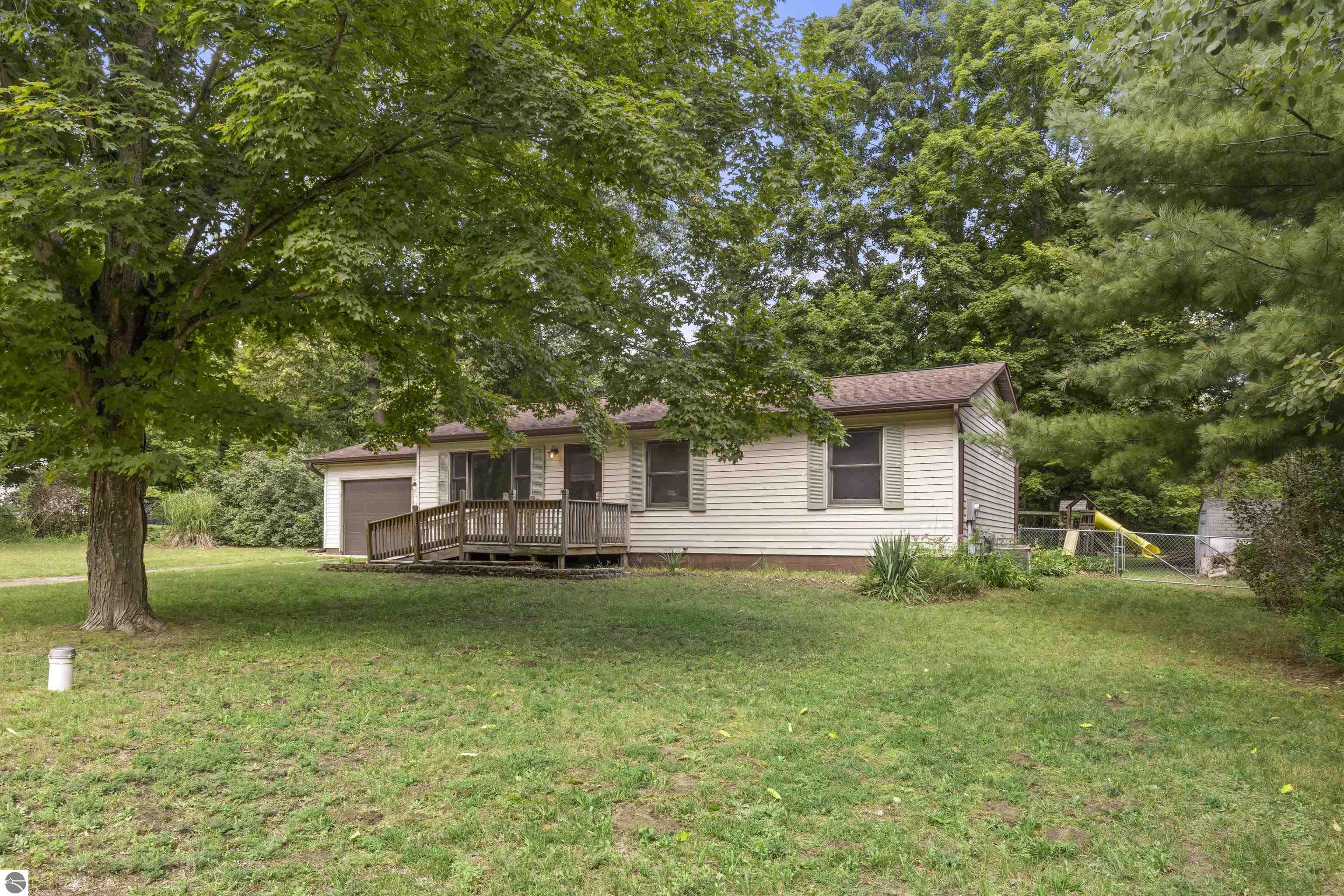 8692 Red Pine Drive, Lake Ann, MI 49650 — front exterior