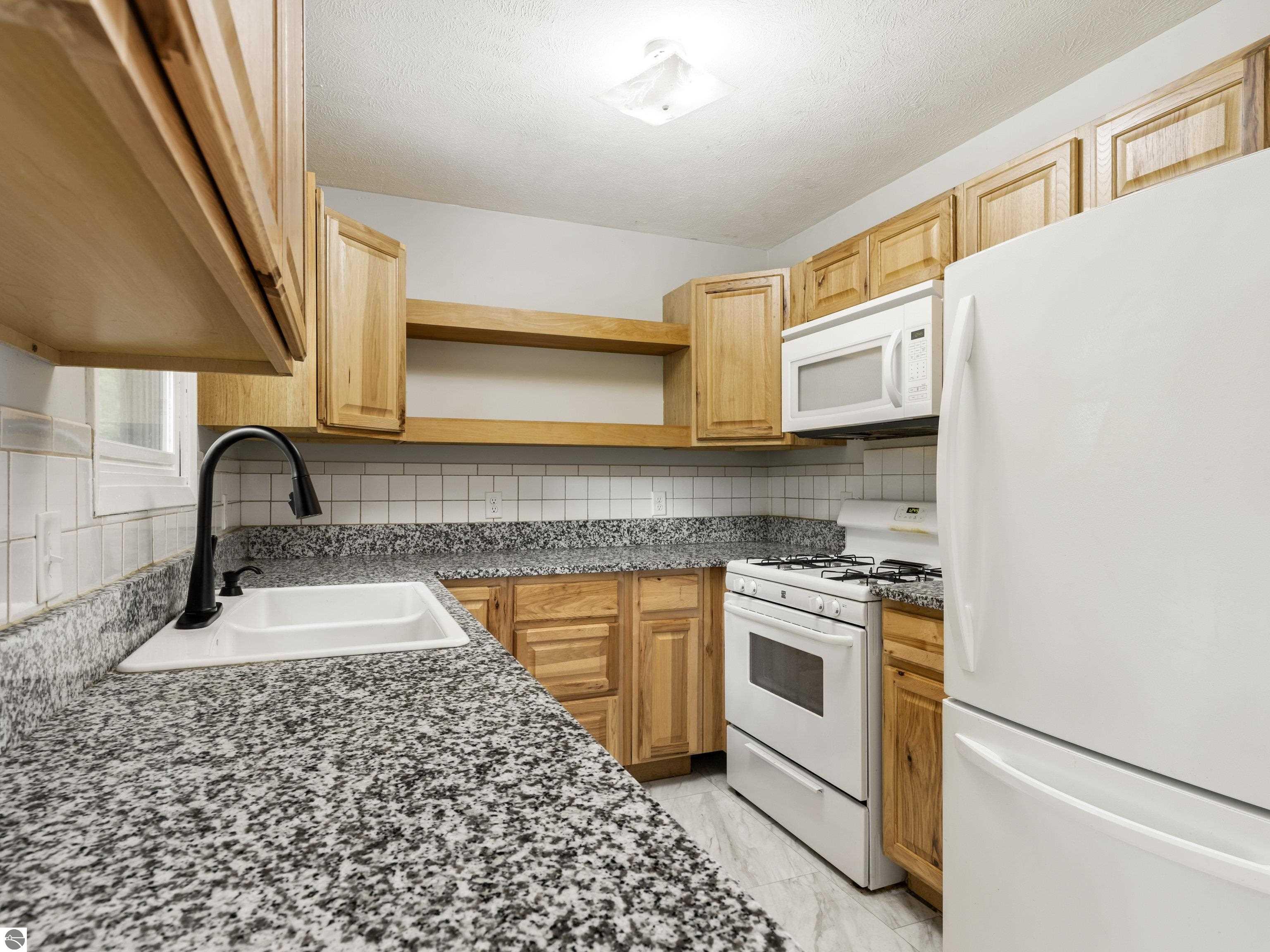 8692 Red Pine Drive, Lake Ann, MI 49650 — Photo 17