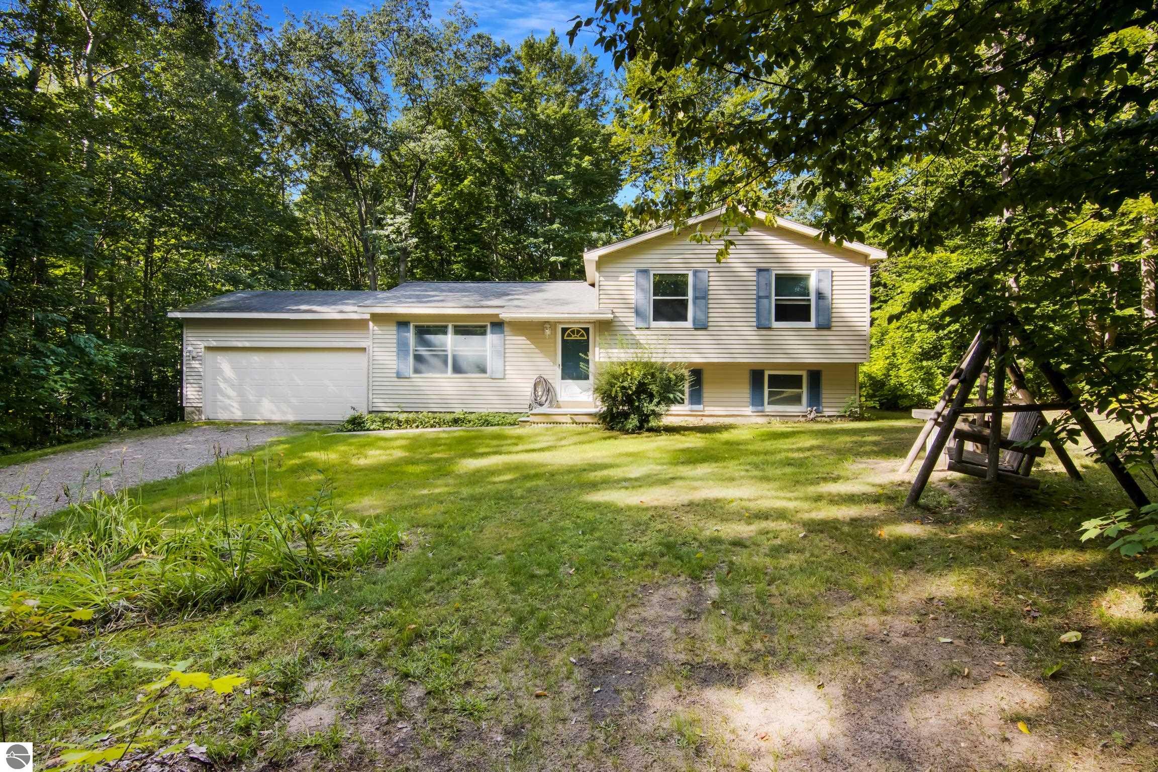 20922 Red Oak Drive, Lake Ann, MI 49650 — front exterior