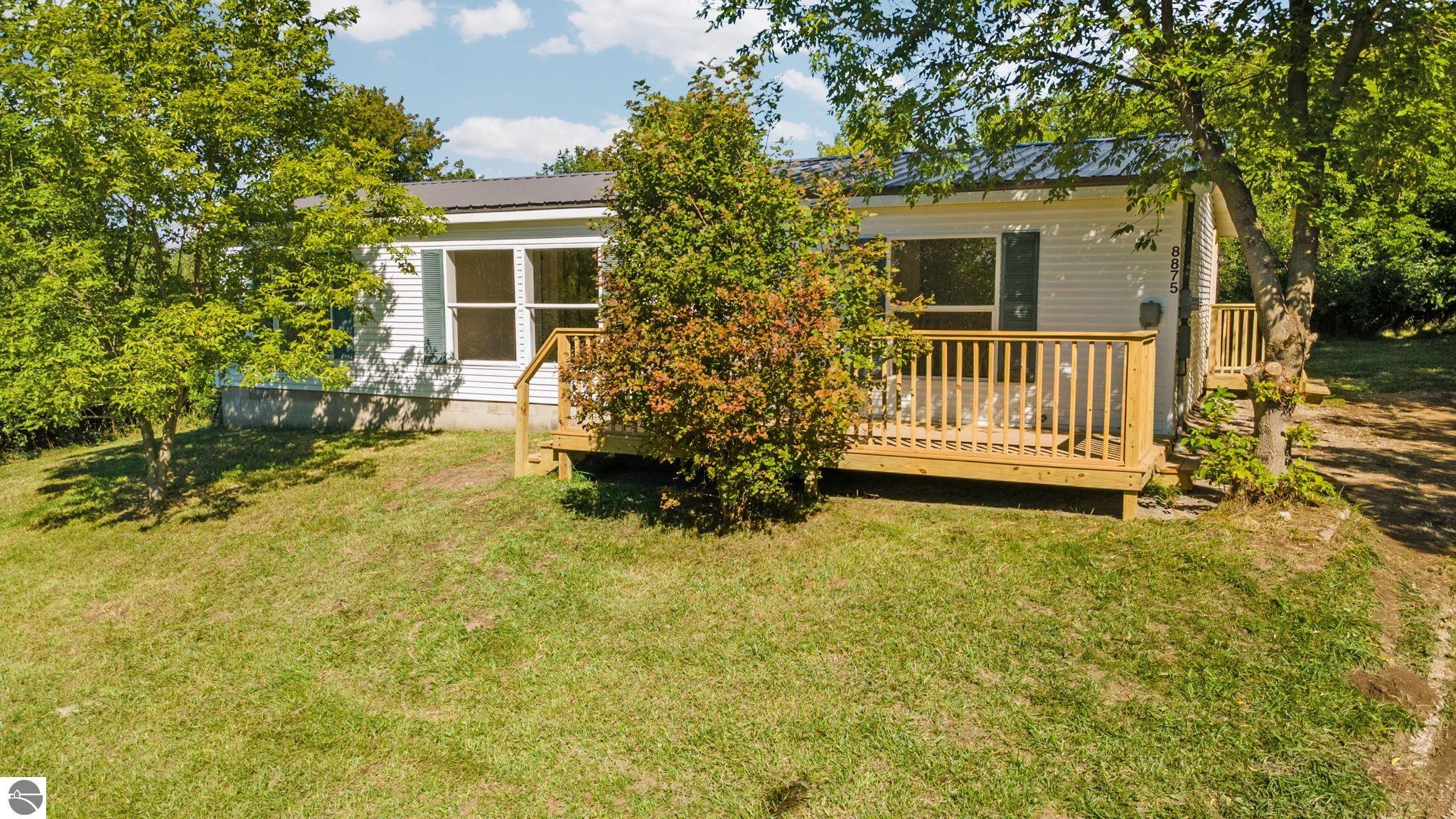 8875 Rahe Road, Kingsley, MI 49649 — front exterior