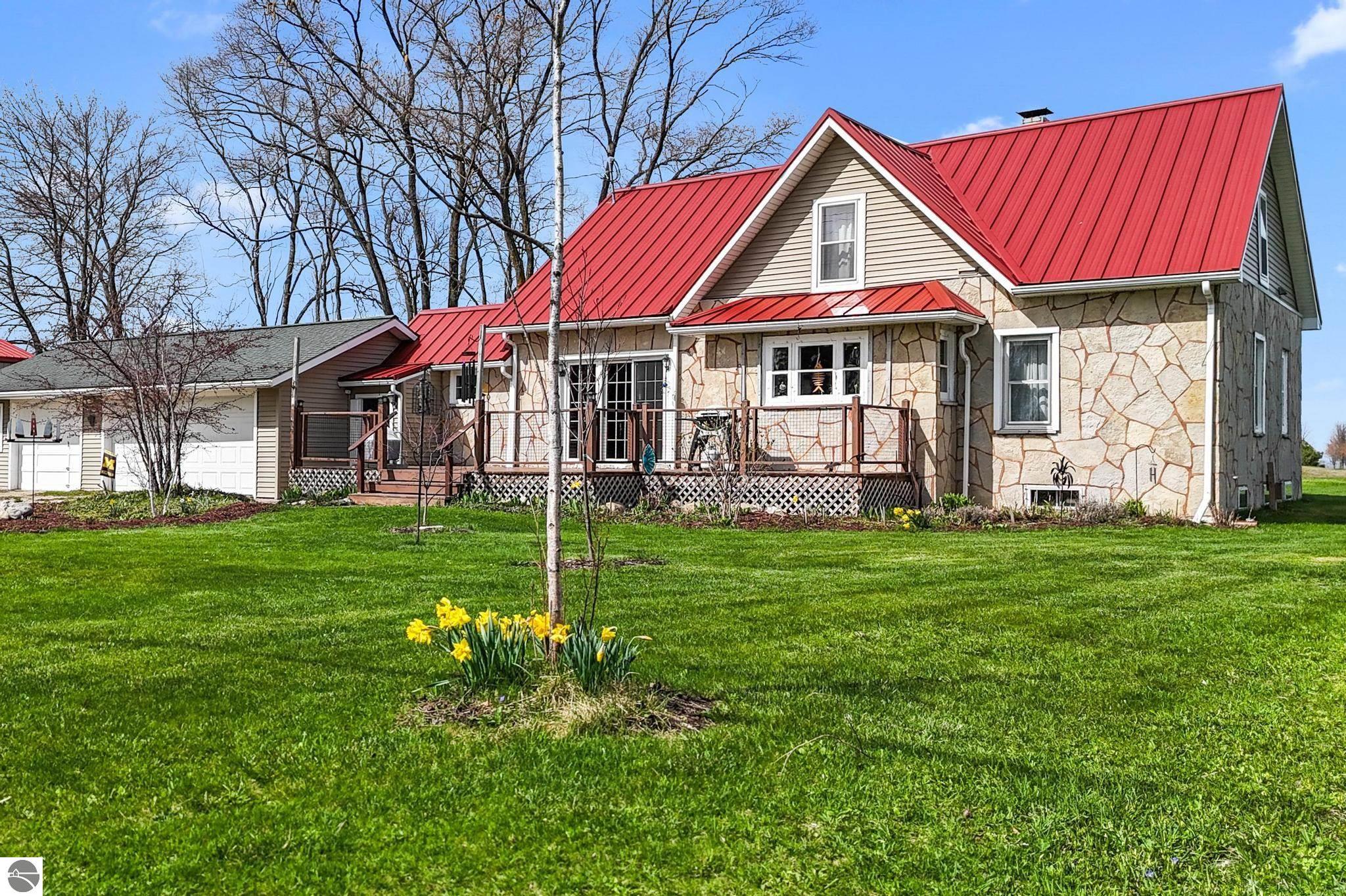 4652 Cairn Highway, Kewadin, MI 49648 — front exterior