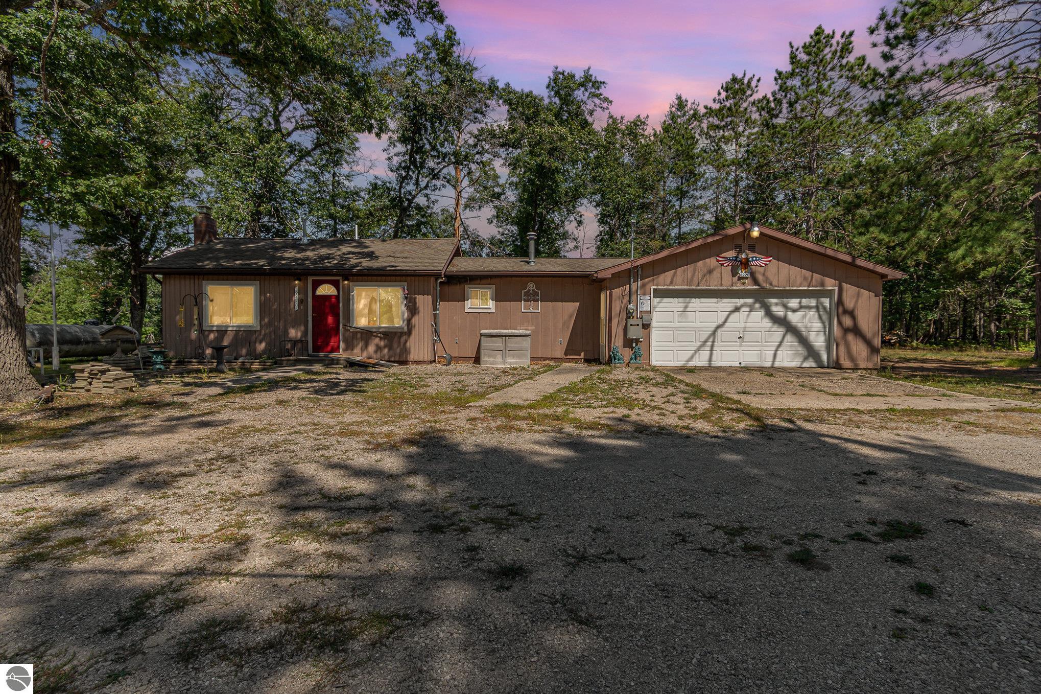 8220 Chain Lake Road, South Branch, MI 48761 — front exterior