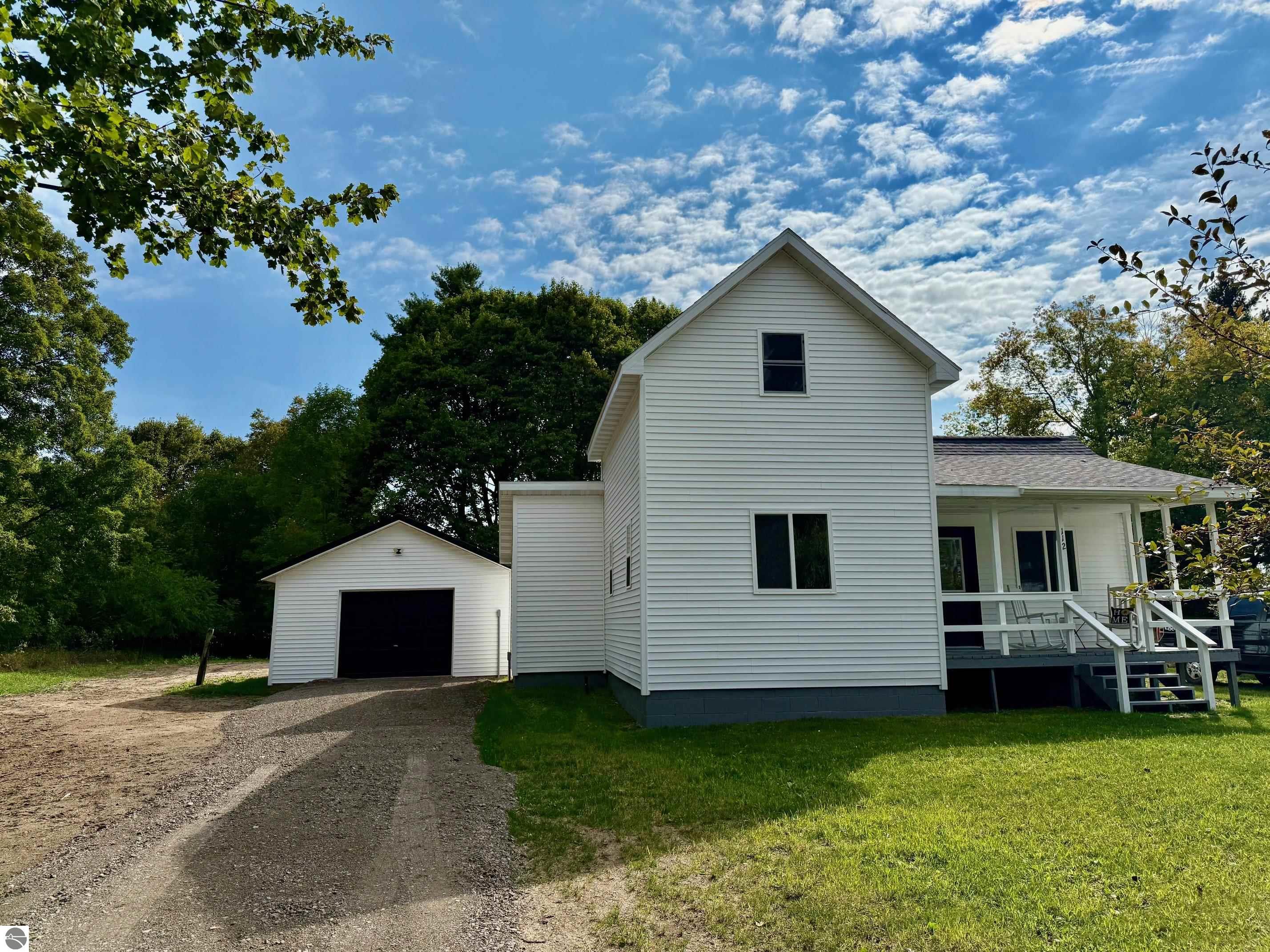 112 N White Street, Marion, MI 49665 — front exterior