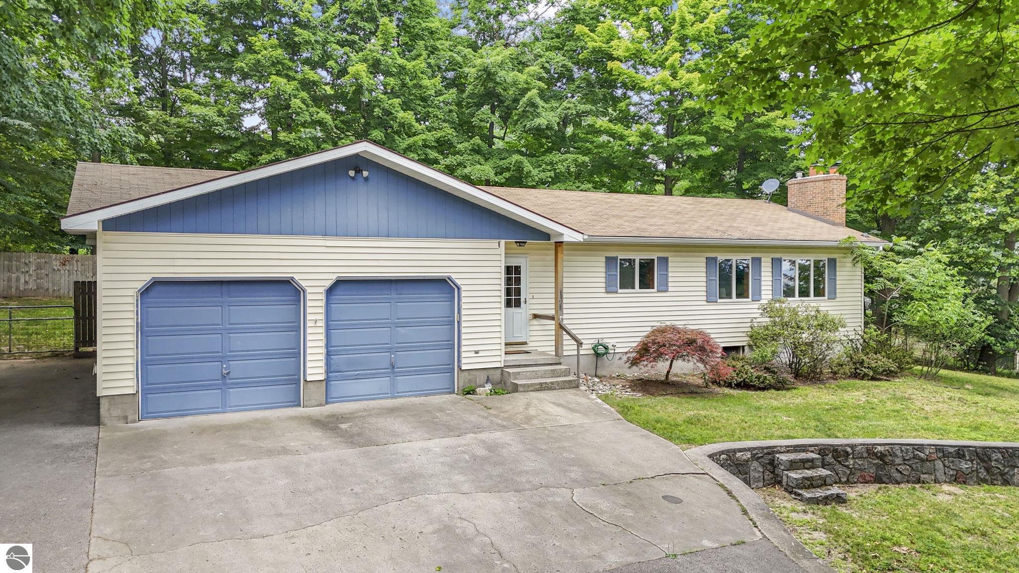 4761 Bartlett, Williamsburg, MI 49690 — front exterior