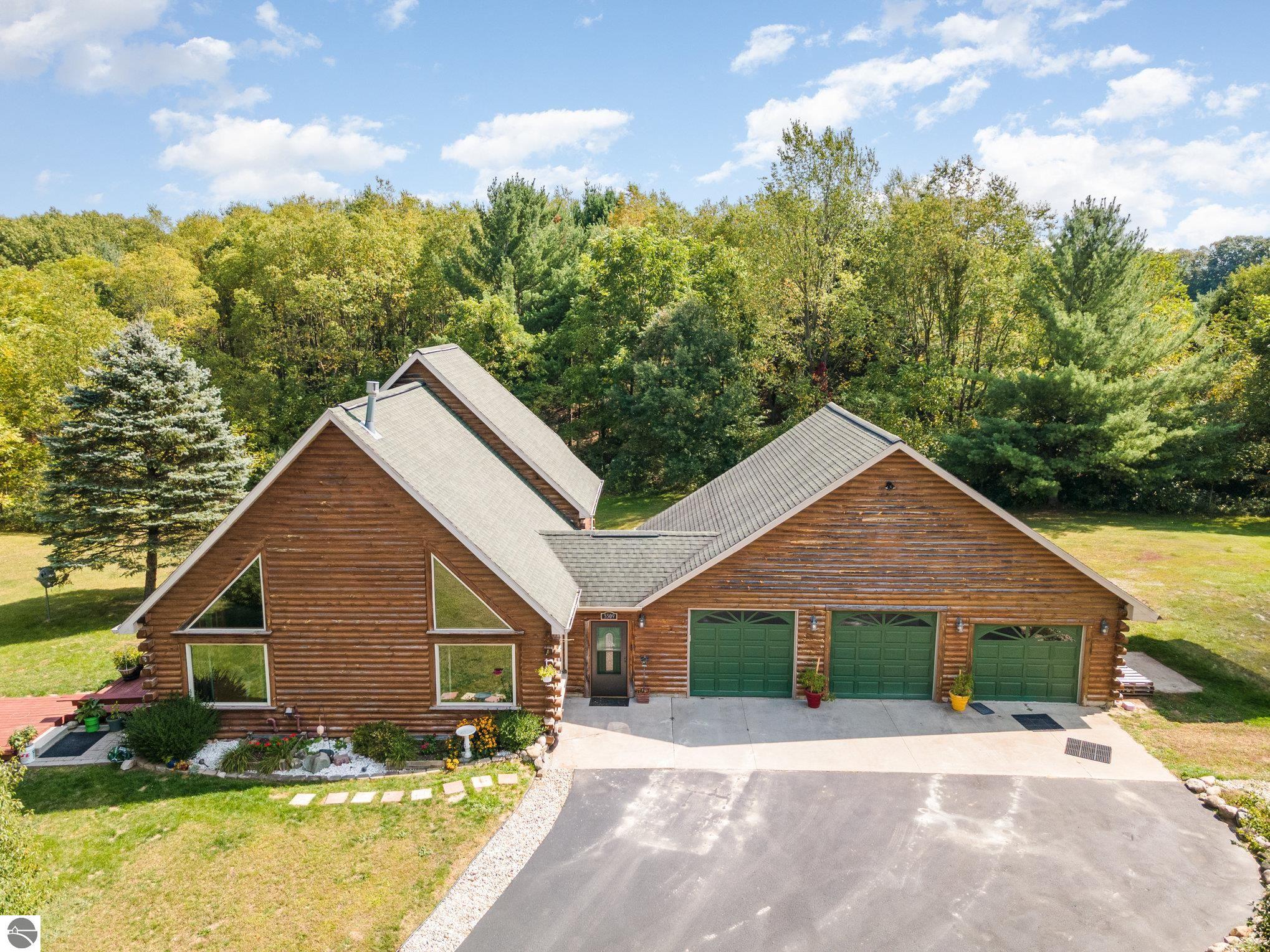 5509 S Littlefield Road, Remus, MI 49340 — front exterior