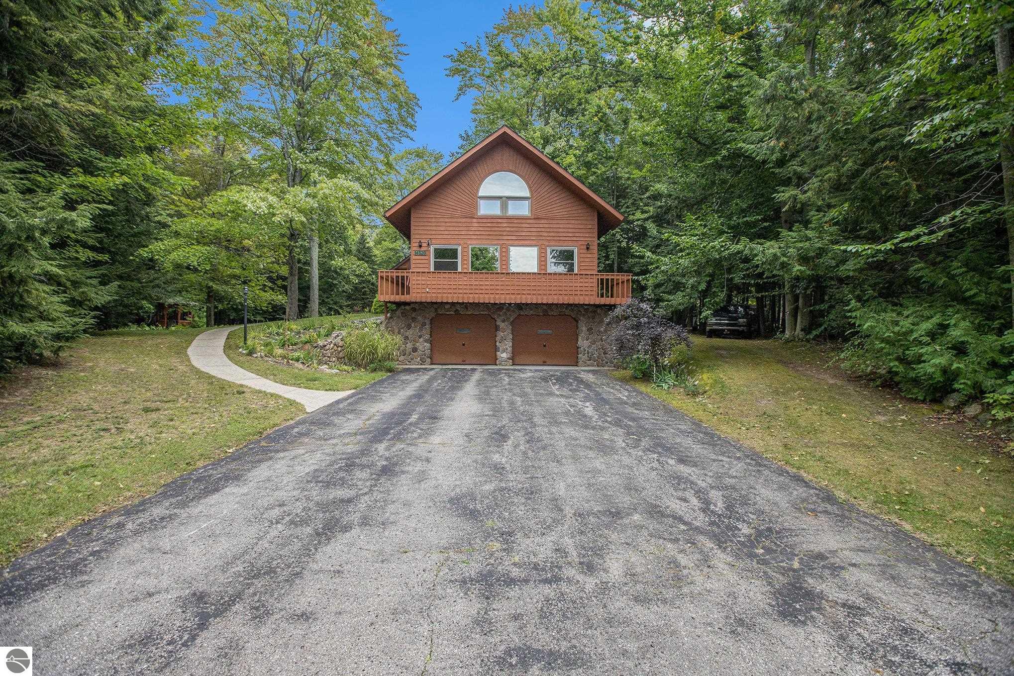 14820 Inwood Circle Drive, Elk Rapids, MI 49629 — front exterior