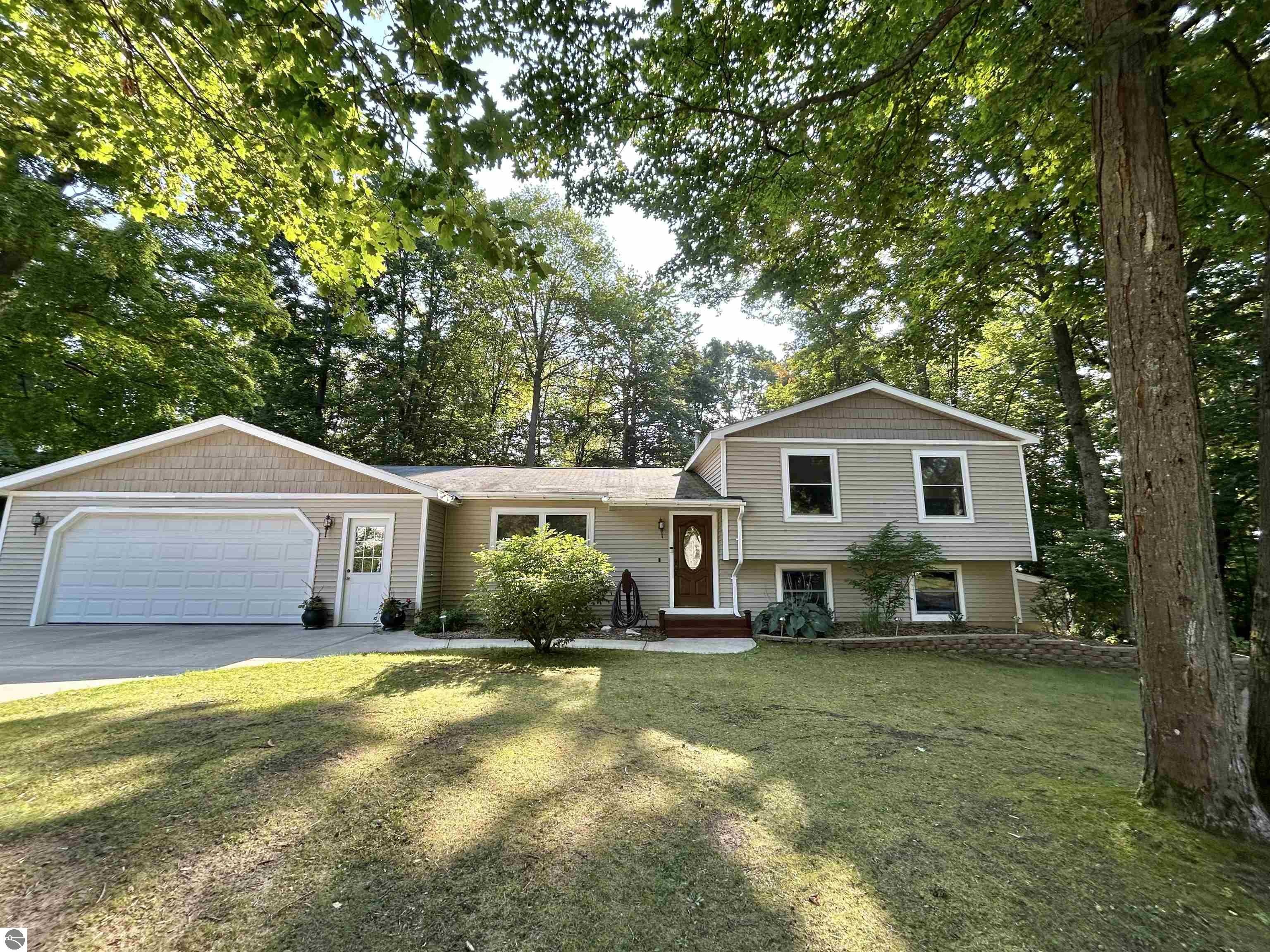 20854 Red Oak Drive, Lake Ann, MI 49650 — front exterior