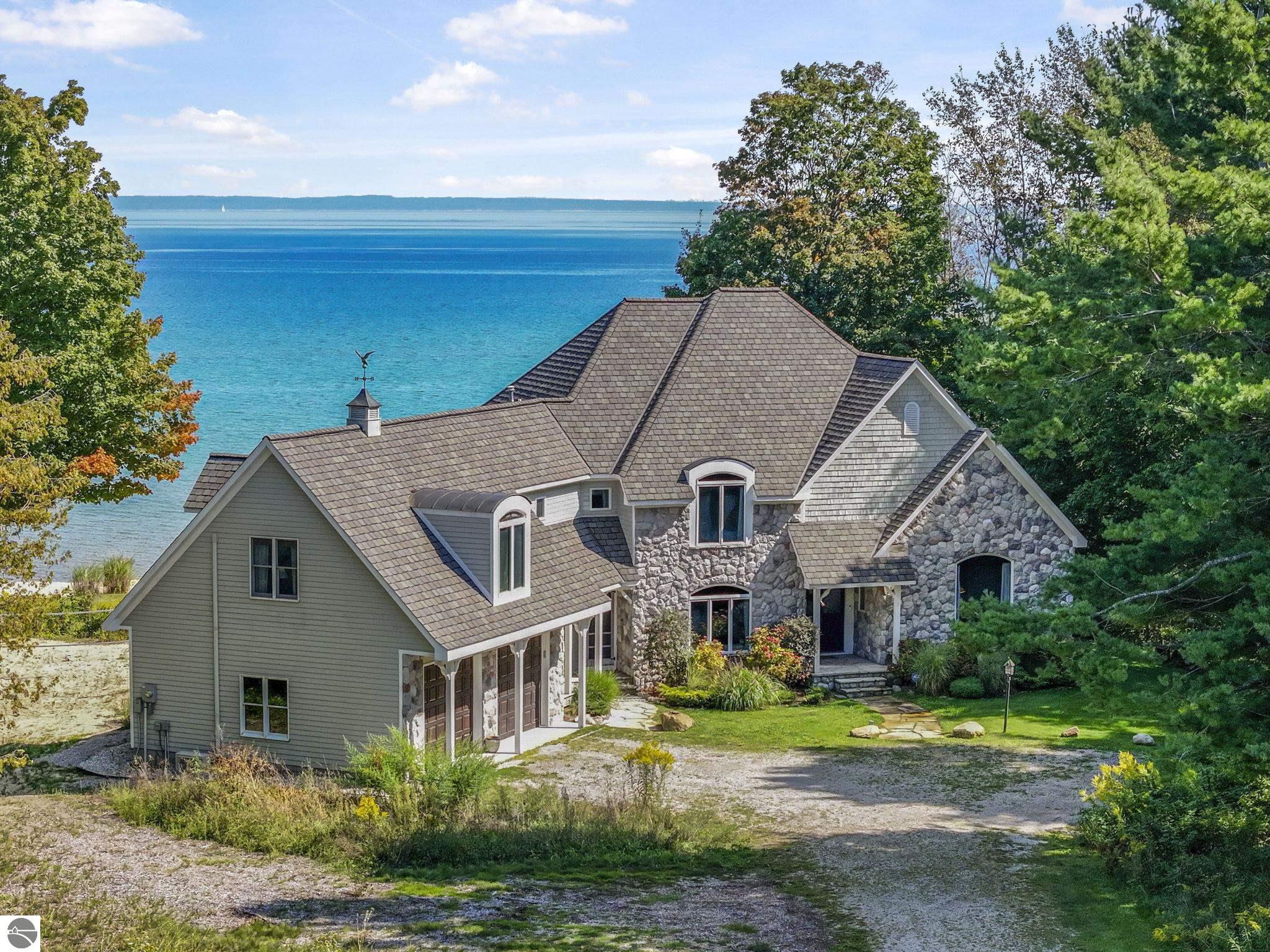 7374 N West Bay Shore Drive, Northport, MI 49670 — front exterior