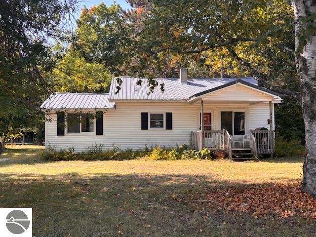 510 S Maple, Mancelona, MI 49659 — front exterior