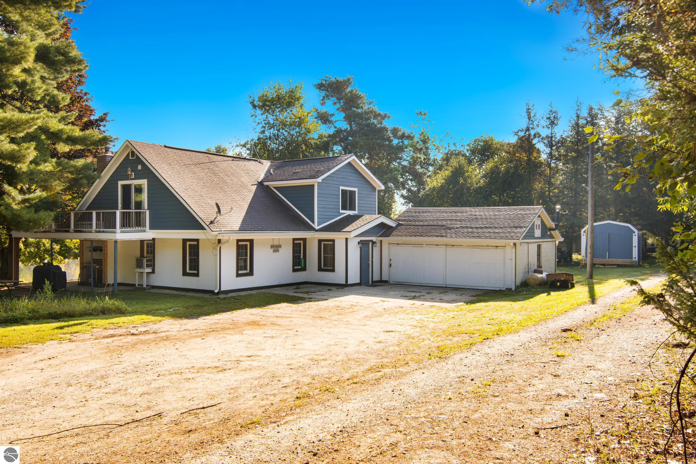 6256 Resort Drive, Ellsworth, MI 49729 — front exterior