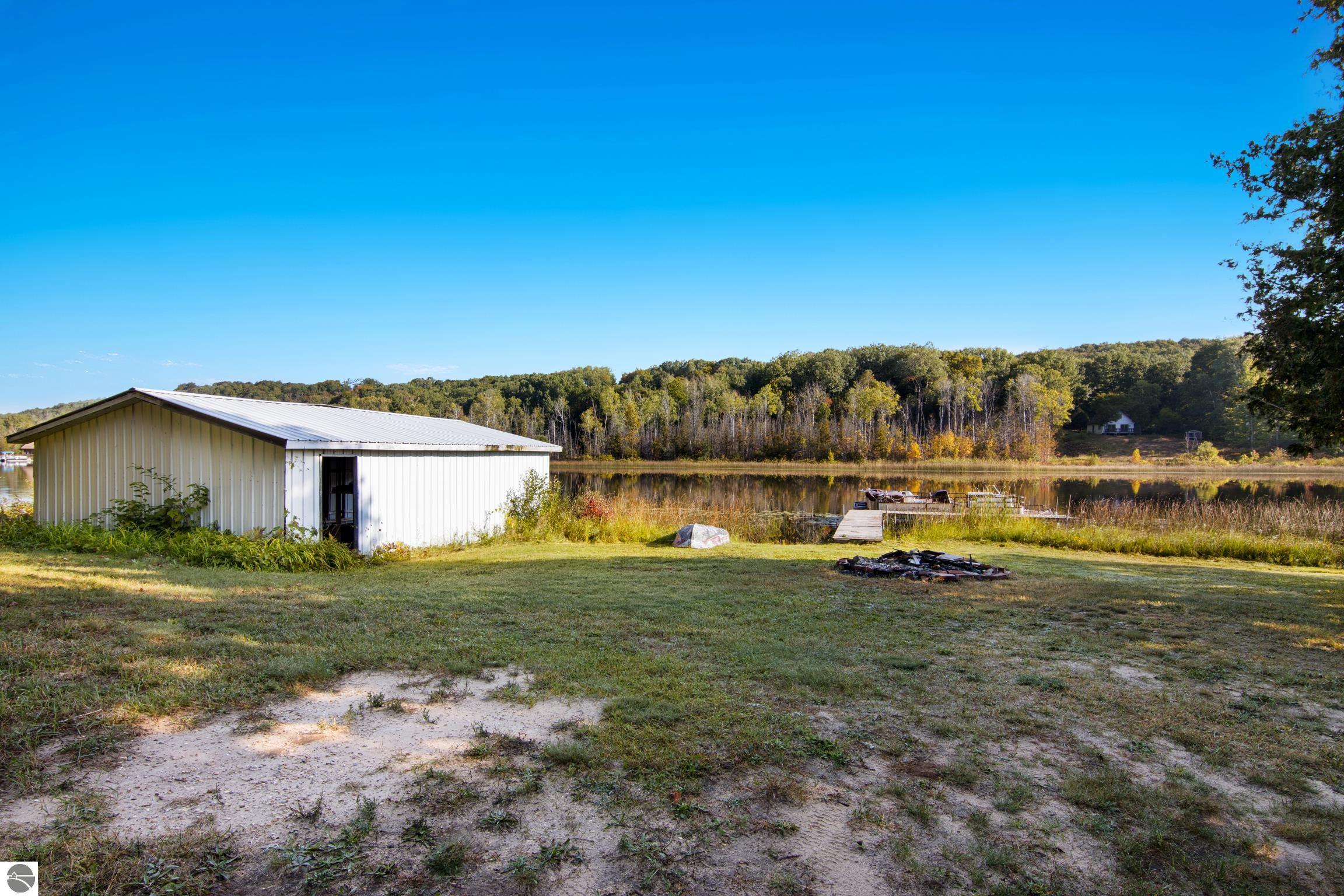 6256 Resort Drive, Ellsworth, MI 49729 — Photo 24