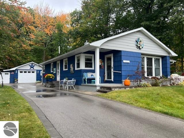 1522 Douglas Drive, Tawas City, MI 48730 — front exterior