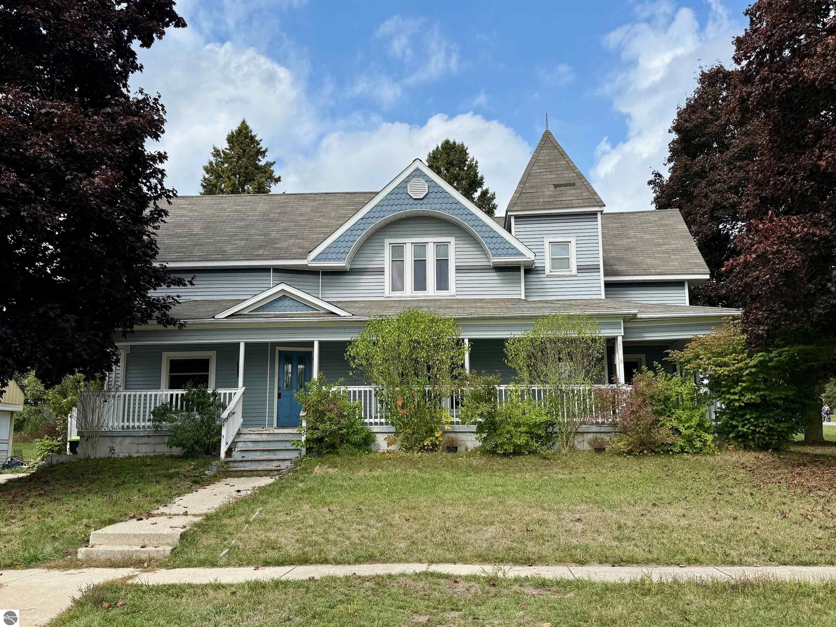 319 3rd Street, Marion, MI 49665 — front exterior