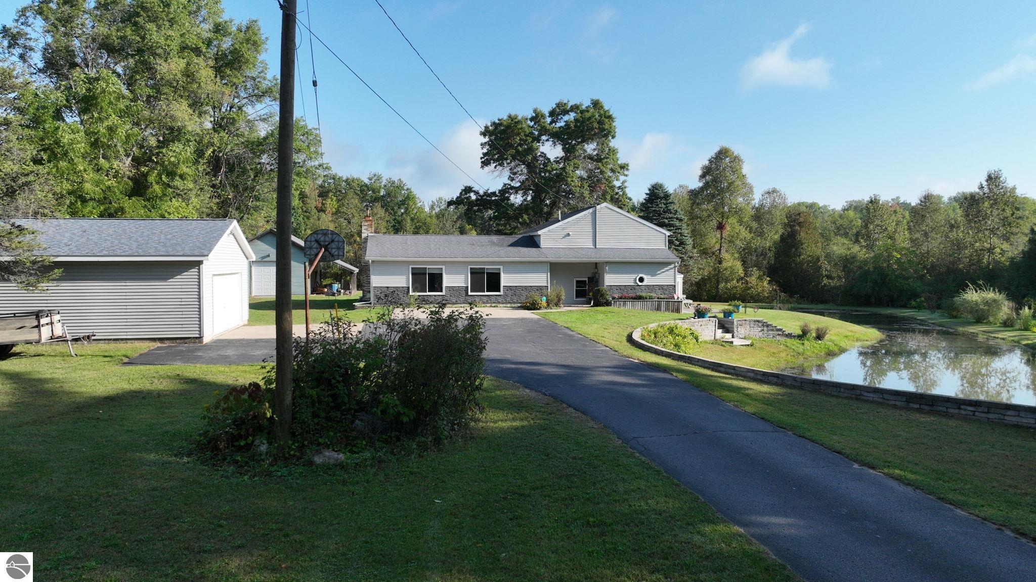 8757 Reiss Drive, Farwell, MI 48622 — front exterior