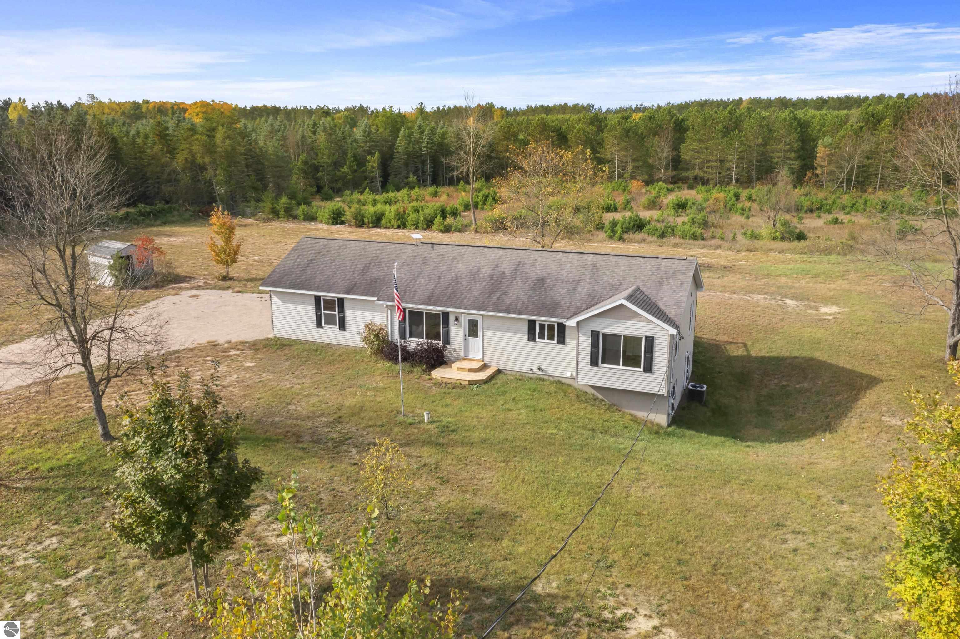 348 S Haze Road, Beulah, MI 49617 — front exterior