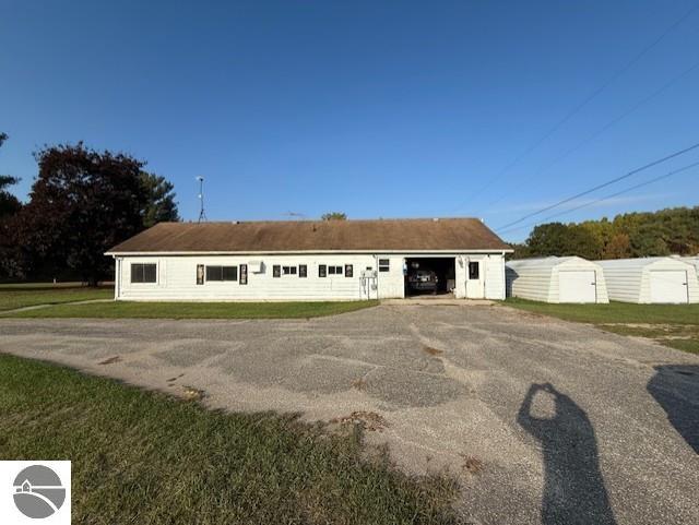 10969 E Lake Montcalm Road, Riverdale, MI 48877 — front exterior