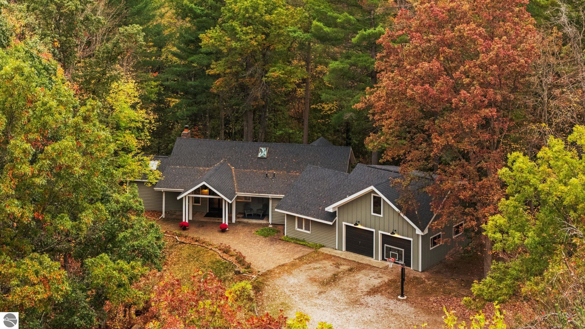 11703 East Drive, Fife Lake, MI 49633 — front exterior