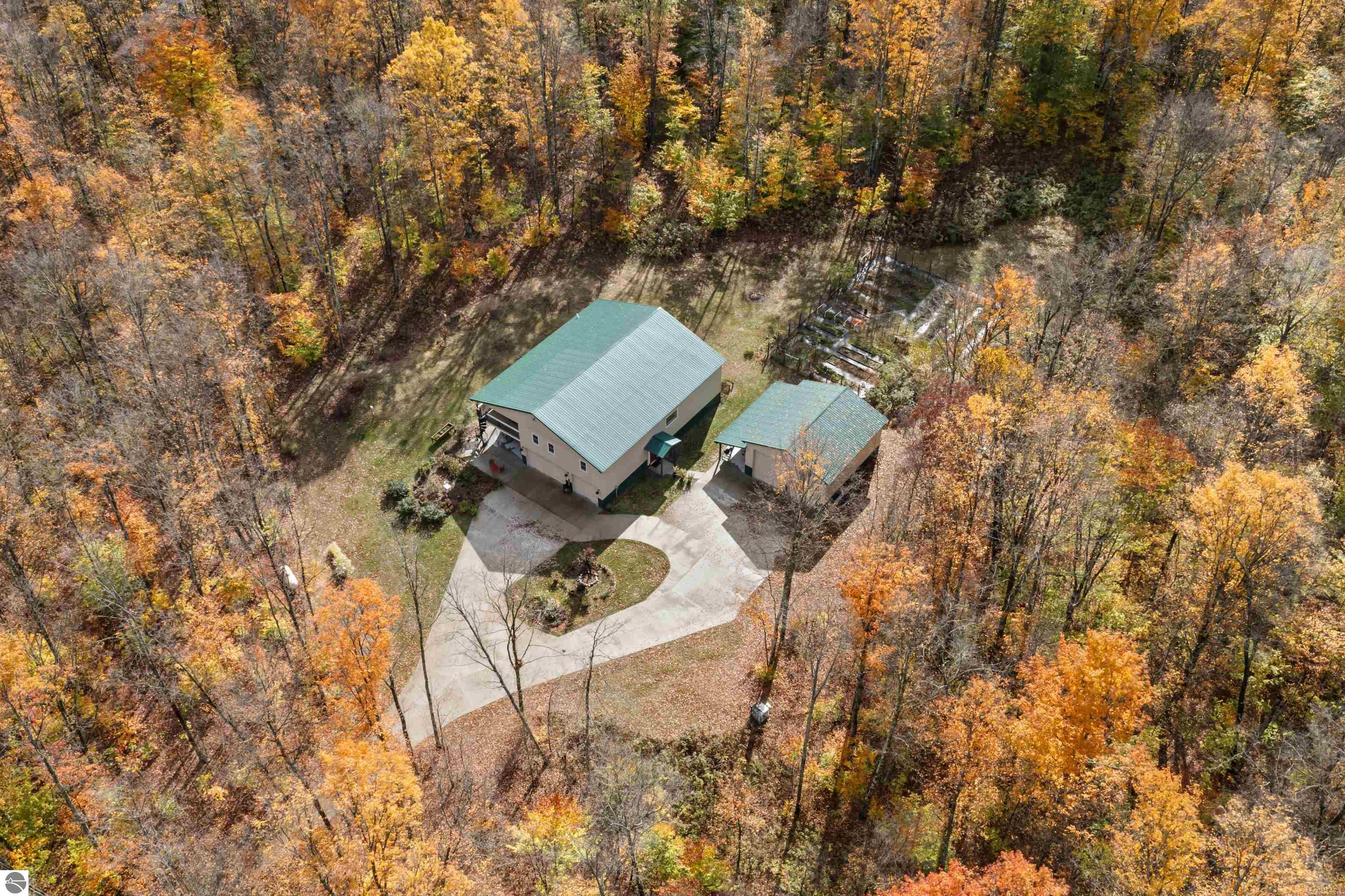 2438 Northwoods Drive, Benzonia, MI 49616 — front exterior