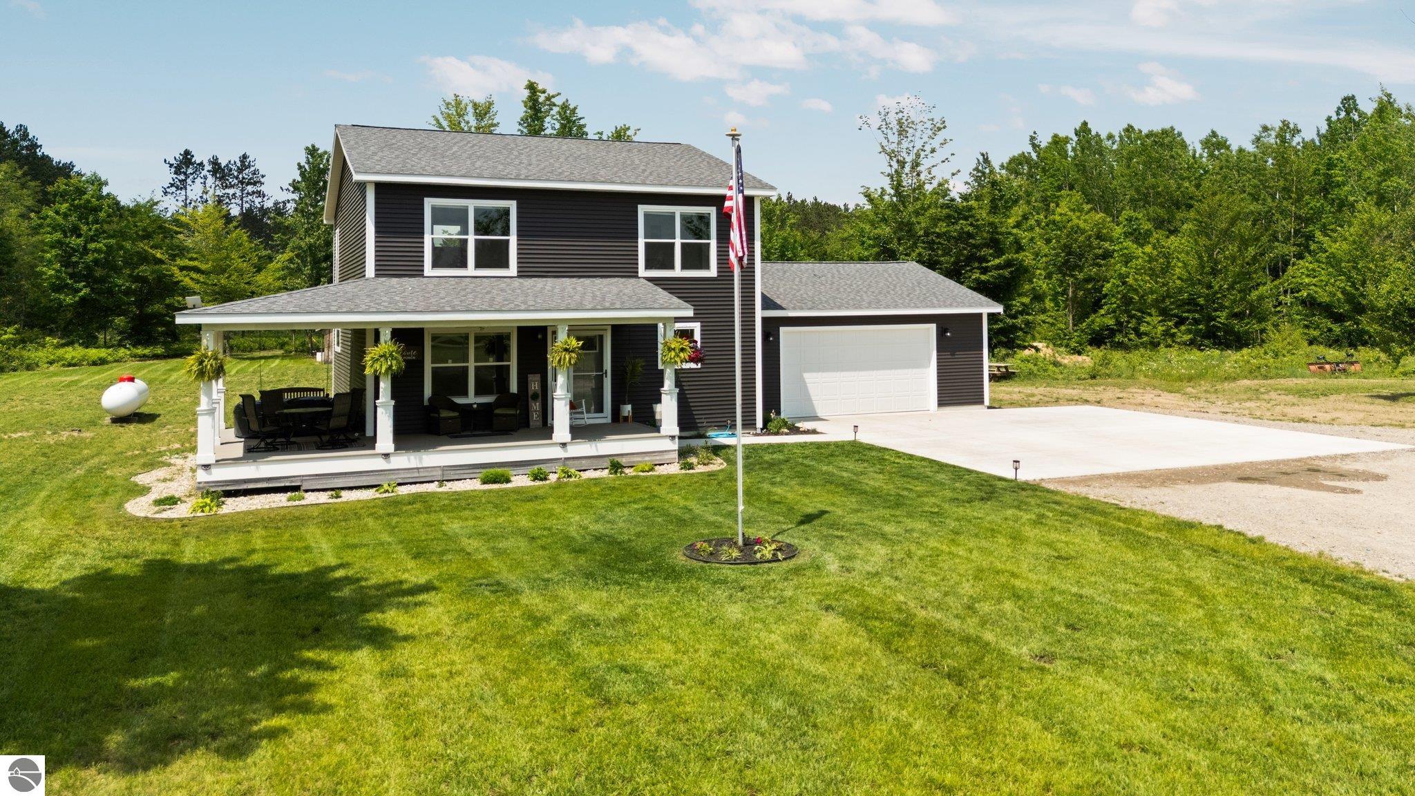 6330 Lund Road SW, Fife Lake, MI 49633 — front exterior