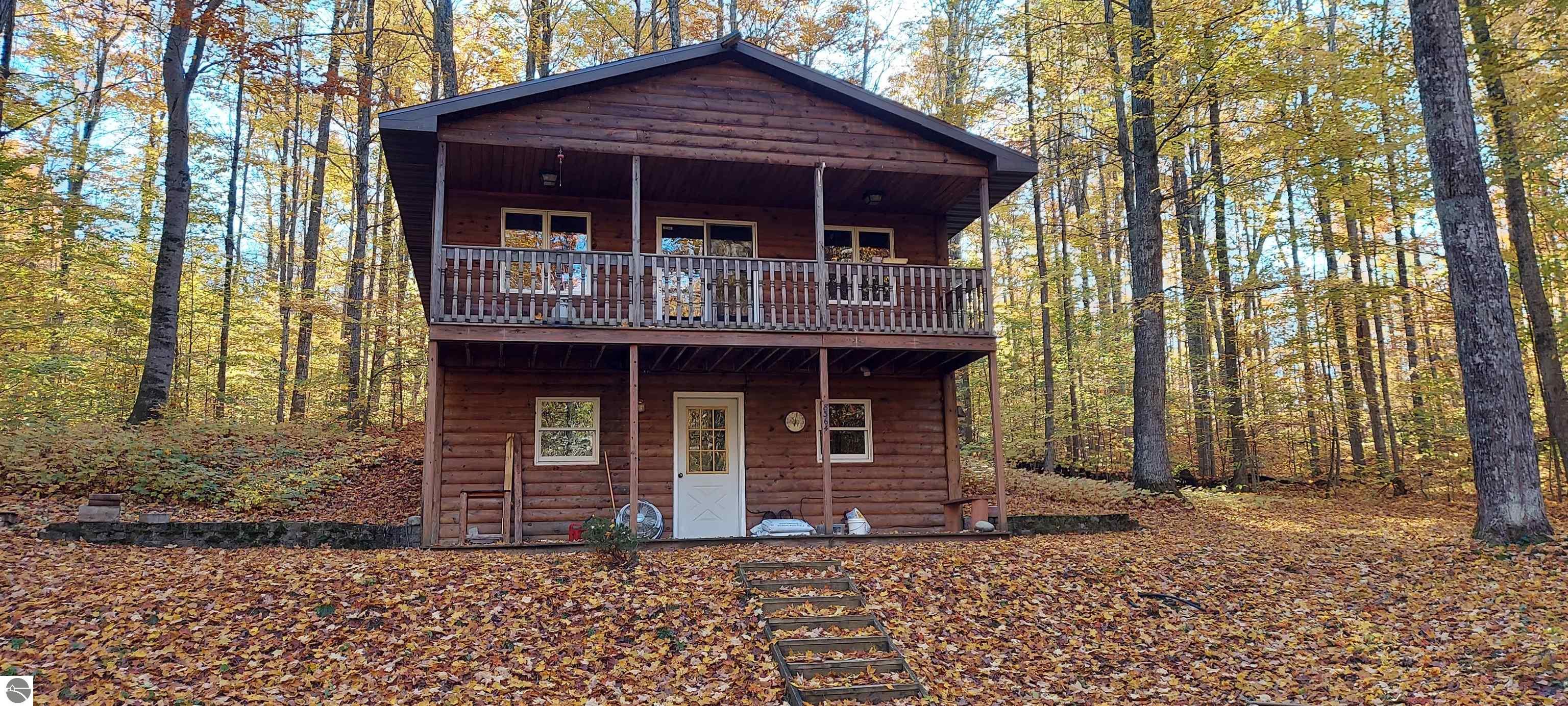8364 Del Mason Road, Mancelona, MI 49659 — front exterior