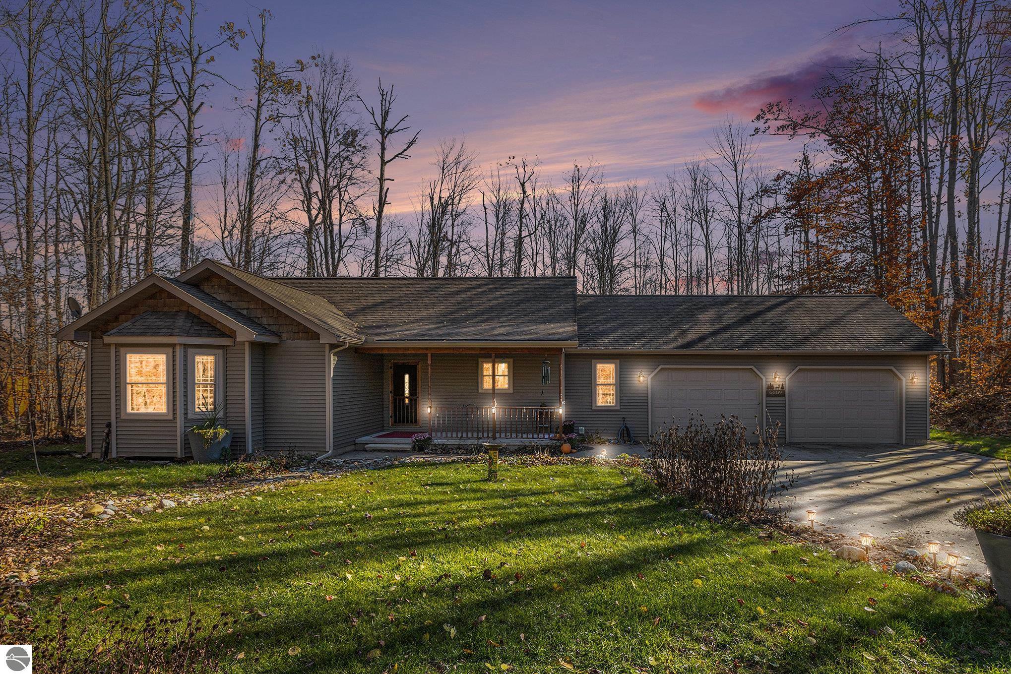 6609 Deepwood Drive, Mancelona, MI 49659 — front exterior