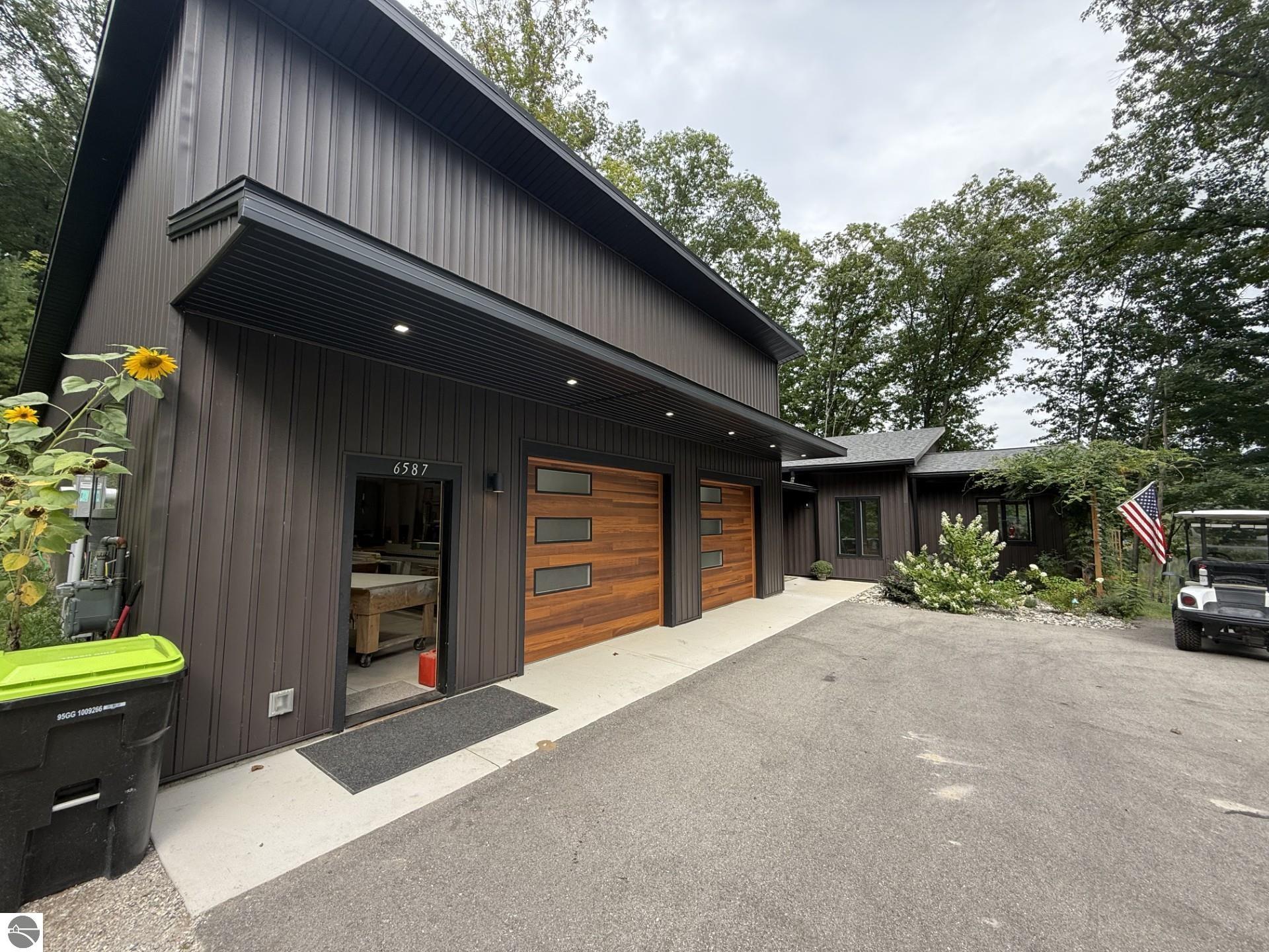 6587 Locust, Lake Ann, MI 49650 — front exterior