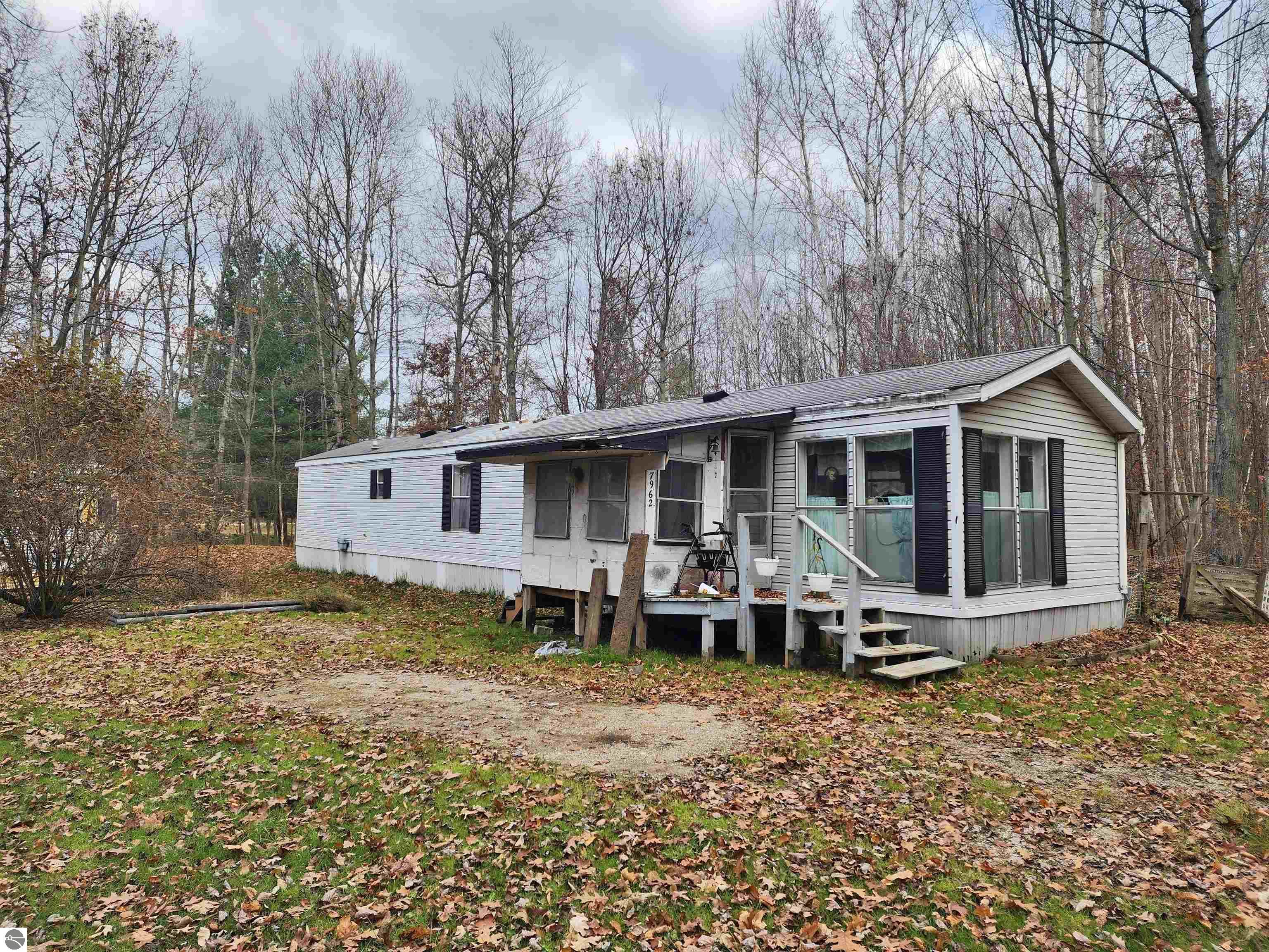 7962 Lawson Lane, Weidman, MI 48893 — front exterior