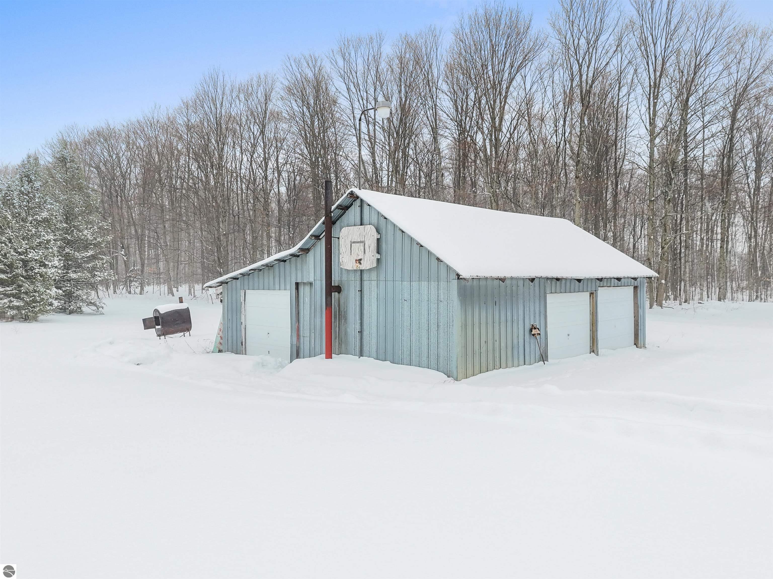 9888 N Wilson Road, Lake City, MI 49651 — Photo 32