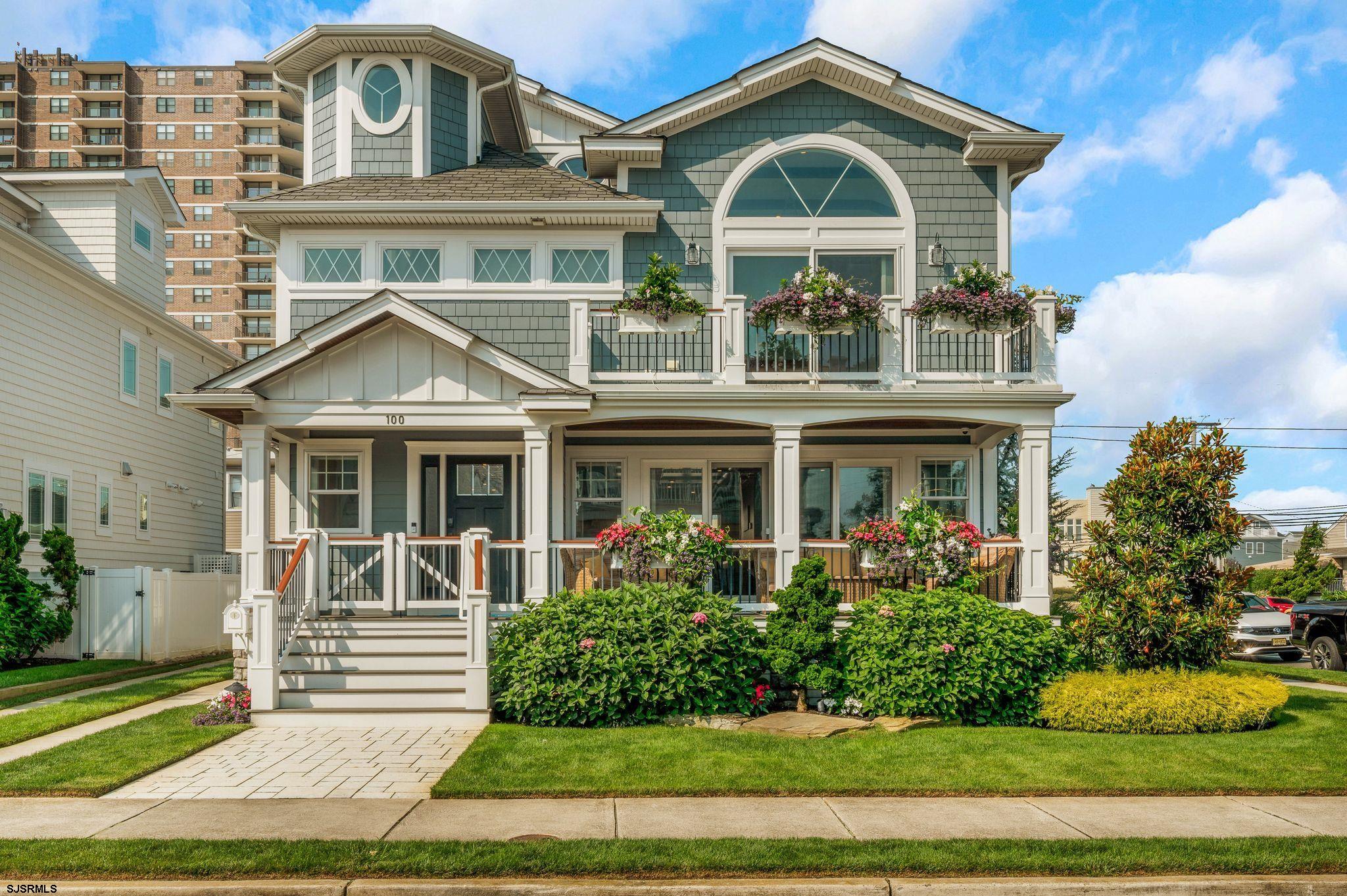 Beach Block Coastal living at its finest in the heart of Margate. This stunning corner  property featuring IN-GROUND POOL, 6 bedrooms and 5 baths is the epitome of the perfect beach house to gather with family & friends.  From the moment you step onto the covered front porch, you discover the enjoyment of relaxation at the Jersey shore. The delightful front porch invites you into the main living area with fireplace and an open design highlighted by high end finishes along with beautiful hardwood flooring throughout this beach house.  The chefs kitchen is delightful and equipped with a large walk in pantry and a spacious center island along with a comfortable dining area. The Sliding glass doors off the kitchen invite you to a covered deck which overlooks the in-ground pool, a great retreat to relax and entertain. Direct access from pool is (1) of (2) laundry areas and a full bath, perfect for use after the beach and pool. Located on a beautiful bright beach block corner with a lot size of 56’ x 80’, this beach house offers 6bd, & 5 baths with the second level showcasing the primary ensuite with deck and ocean views. Also featuring 3 guest bedrooms and 2 baths and an additional laundry area. The third level offers 2 additional bedrooms and a bathroom, a perfect layout for extended family and guests. Also featuring a detached garage and off street parking!  Don't miss this wonderful opportunity to own a beach house and enjoy the Margate fun life with amazing restaurants and activities for all ages.
