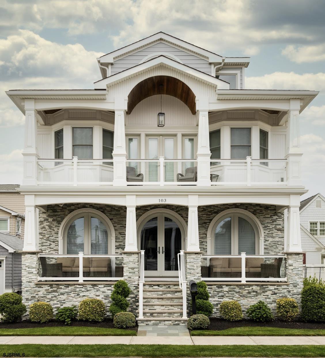 *NEW PRICE* Enjoy MARGATE, BEACH BLOCK living with POOL, ELEVATOR ! Located just 3rd home from the beach & custom built in 2017 by Piraino Builders. This home exudes a coastal style and many amenities & upgrades -5 Bedrooms (5th bedroom on plan is currently used as a loft with wet bar) 3 Full baths, Powder room and 2 laundries. Exterior is finished with James Hardie cement siding, mahogany porch ceilings & beautifully crafted barrel ceilings, natural stacked stone accents & blue stone porch, spray foam insulation, glass insert railings, Anderson windows & custom Andersen arched doors, Azek bead board & column details, built in outdoor tiled shower & 8x10 storage shed,  3 off street parking spots with convenient exterior elevator stop and electric car charger. Rear of property includes paver patio, natural gas line, in ground heated gunite pool w/ raised wall, waterfalls, Iphone connectivity and keyless rear access to first level. The first floor shows beautifully with an open concept kitchen/living/dining, custom millwork package consisting of wainscoting, coffered ceiling, gas vented fireplace, decorative mantle and marble surround. Kitchen includes SubZero/Wolf paneled appliance package (36" gas range with burners, 36" French door paneled fridge, paneled dishwasher, paneled double fridge drawers microwave drawer), large island plus peninsula with convenient workstation. First floor den fitted out with built ins to allow for plenty of storage/dry bar & built in drop station for bags, shoes & towels, a farmhouse style powder room & convenient stackable W/D for pool & beach items. The second floor is comprised of two generous sized bedrooms which share a tub bathroom, oversized vanity with dual faucets & natural marble, full sized laundry room fitted out with washer/dryer, cabinets, farm sink & folding area and storage cabinets. The Primary bedroom sits upfront with direct ocean views & independent deck access. Large WIC, custom bench seats in the bay windows and Somfy electronic shades. The primary bathroom is finished with classic details throughout, some of the amenities include dual sinks with storage tower and makeup counter, direct ocean views, separate water closet, marble with floor inlays and upgraded thermostatic shower system with bench and body sprays. Up to the 3rd floor, one generous sized bedroom, full bath, loft (or a 5th bedroom) with direct ocean views & wet bar. Dimmers- speakers- cameras- alarm- closet fit outs- very REASONABLE TAXES for beach block with all of these amenities- custom window treatments. Beautifully upgraded and ready for enjoyment! See virtual tour!