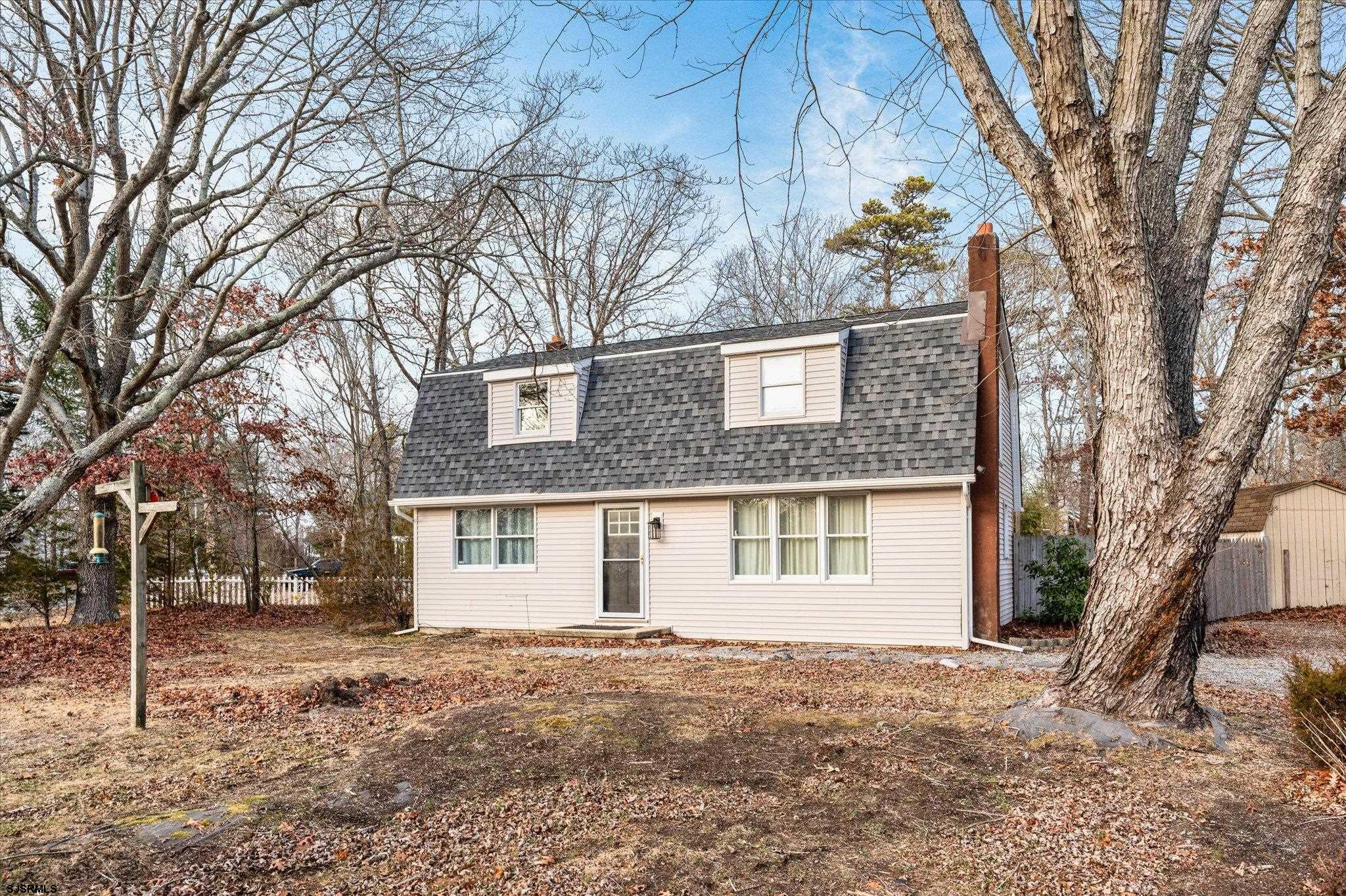 Welcome to 15 McDonald Drive, where all the work is done…all you have to do is move in! This 4-bedroom 3 bath beauty sits on a corner lot in a quiet Upper Township residential neighborhood.  The home just went through a full renovation (2024) including: Brand new kitchen cabinets, countertops, stainless-steel appliances, new maintenance free vinyl flooring, new fencing, renovated bathrooms with custom tile, new paint throughout and custom trim work. The first floor features an open concept living and kitchen area with center island seating, tons of natural light from large windows, two bedrooms and a full hall bath. Upstairs is a spacious primary bedroom with its own private full bath, tons of closet space, tons of natural light, an additional bedroom, laundry room, and another full hall bath! In the back you can enjoy bonfires, BBQs, and let the four-legged friends run free in a fully fenced in backyard. Come be a part of one of the area's best townships, with award winning school district (Upper township and Ocean City High School district) and close proximity to all shore points. Schedule your showing today!