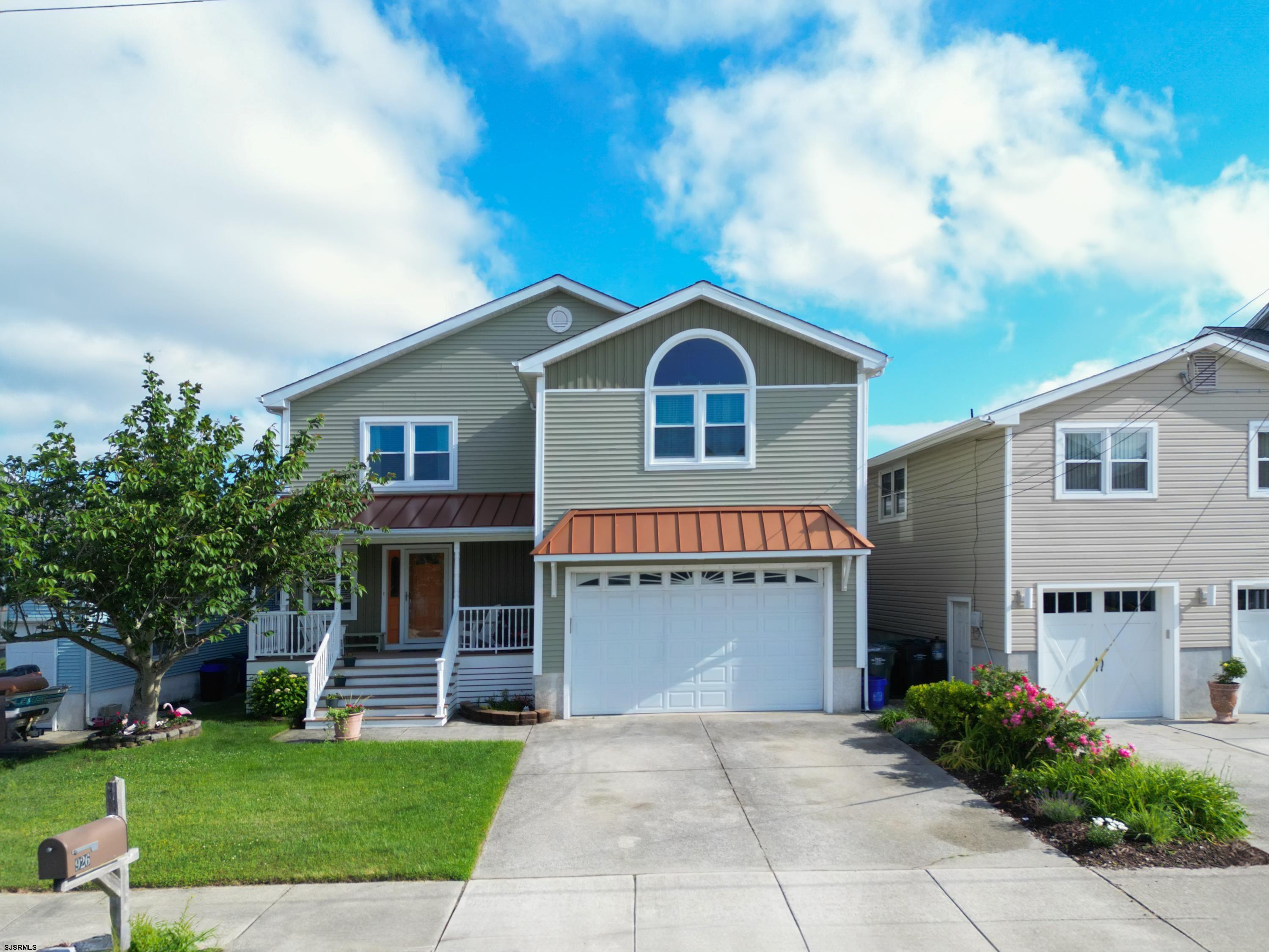 An extraordinary opportunity to own a custom-built, turn-key bayfront home in Brigantine! Nestled in a prime Shore location, this stunning five-bedroom, three-and-a-half-bath residence showcases a distinctive multi-level design with breathtaking bay views from nearly every room.    Upon entering, a bright and welcoming foyer greets you. To the right, a spacious half bath adds convenience, while straight ahead, a private secondary living space or a mother-in-law suite features a full kitchen, a comfortable living area, and two generously sized bedrooms with a full bath. Step outside to an expansive deck that leads down to the backyard and private dock—perfect for embracing the waterfront lifestyle.    Upstairs, the home boasts an open-concept layout ideal for entertaining. A spacious dining area flows seamlessly into a striking living room with soaring cathedral ceilings, exposed wooden beams, and an abundance of natural light. The main kitchen overlooks this inviting space, and just beyond, a second deck offers the perfect setting to enjoy the bay breeze and spectacular sunsets. Also on the second level are two additional guest bedrooms, as well as the primary suite, which features two walk-in closets and a beautifully renovated bathroom with a walk-in shower.  This meticulously upgraded home features new custom flooring, a renovated guest bath, and updated heating and air conditioning systems for the upper level. The living room and bedroom windows have been replaced, while the first-floor living room and kitchen received new flooring in November 2022. Additional enhancements include new heating and air conditioning for the first floor, upgraded sliding glass doors, new siding, a new roof, and solar panels—significantly reducing monthly electric costs. (Please inquire for the full upgrade list and seller's disclosure.)    Your private dock serves as a gateway to waterfront adventures, with opportunities for fishing, crabbing, kayaking, and two boat slips. Brigantine is truly a hidden gem, just 10 minutes from vibrant nightlife and an array of dining options. Nearby, enjoy a dog park, a dog-friendly beach, and a scenic seawall perfect for leisurely strolls at the island’s end.    This exceptional location also provides breathtaking wildlife views and access to Brigantine Golf Links, New Jersey’s premier Scottish Links-style course. Relax on award-winning beaches and immerse yourself in the tranquility of island living. Why spend over $1,600,000 on a vacant lot when you can own a move-in-ready bayfront home, fully prepared for you to enjoy this spring and summer?   Set sail into the sunset and experience the best of bayfront living in Brigantine! ~The furniture is available for negotiation.
