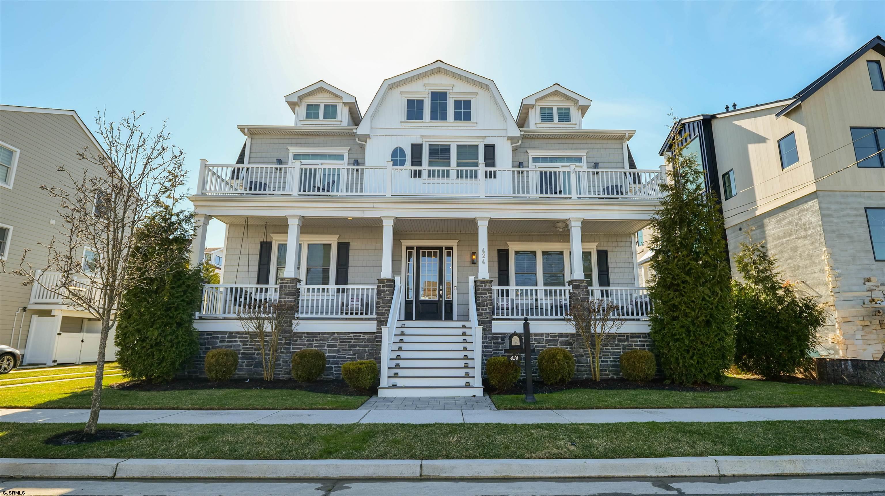 “Like new” luxury construction beautifully positioned in the highly desirable Parkway section of Margate and located on Margate's finest St., Quincy Avenue. The immense lot size (75'x80') is the catalyst for generous double tier decks on the front of the property, which span the entire length of the house capturing bay views and are the perfect area to entertain family and friends or just relax and enjoy life at the shore! The rear yard area is amongst the finest and most functional in all of Margate and is highlighted by a very large Gunite heated pool, large patio area, which can easily accommodate all of your family and friends along with a beautifully manicured side yard area. As in the front of the property, the double tier deck design exists in the rear overlooking the pool area and creates an elevated common space to gather and entertain with the upper deck, providing access from the 2 rear bedrooms. As a point of comfort and convenience the elevator is on grade level and is accessed through a finished foyer area off the driveway, which easily accommodates 4 vehicles. The detached garage is the perfect location for storage of all of your beach toys, golf cart, or your high-end classic car.  The 8-foot custom front door invites you into dramatic space featuring, an open floorplan concept, highlighted by soaring 10 foot ceilings, custom millwork package including Coffered ceilings, wainscoting trim and upgraded casement moldings. The chef’s kitchen is sure to excite and boasts shaker style white cabinets with upgraded trim pkg, large pantry with full extension pull out drawers, white quartz countertops, perfectly accented with a white cast-iron farm sink. The stainless-steel appliances are upgraded and include a 36-inch gas range and built-in refrigerator with French doors and a pull-out freezer. The large quartz island can easily accommodate seating for 5 and is adorned with a built-in microwave and beverage center. The adjacent dining room is generous but cozy and offers a large sliding glass door to access the entertaining deck and pool area. Off to the side of the house you will find the washer dryer/mudroom with wonderful storage space, elegant full bathroom, boasting a large walk-in shower complete with bench, rain, head, glass, shower surround, and custom fixtures. A large flex room which could easily be used as a bedroom or home office featuring a fully loaded designer full bathroom rounds out the first level. The second level is as dramatic and well thought out as the first level and features a second laundry room. Four large and comfortable en suites with the primary suite being located in the front of the building with deck access, vaulted ceilings, dual walk-in closets and a truly five-star bathroom featuring, soaking tub, incredible walk-in shower, dual custom vanity with marble top and custom cabinet along with a private water closet. The adjacent en suite mimics the primary suite. The two suites in the rear of the property are equally as impressive with lots of oversized windows, allowing an abundance of natural light into the space and has deck access which overlooks the pool area. Additional upgrades include plantation shutters, Storm, Guard security windows featuring motorized custom shades and blinds. This impressive property is being sold with the entire designer contents with the exception of a few minor personal exclusions.