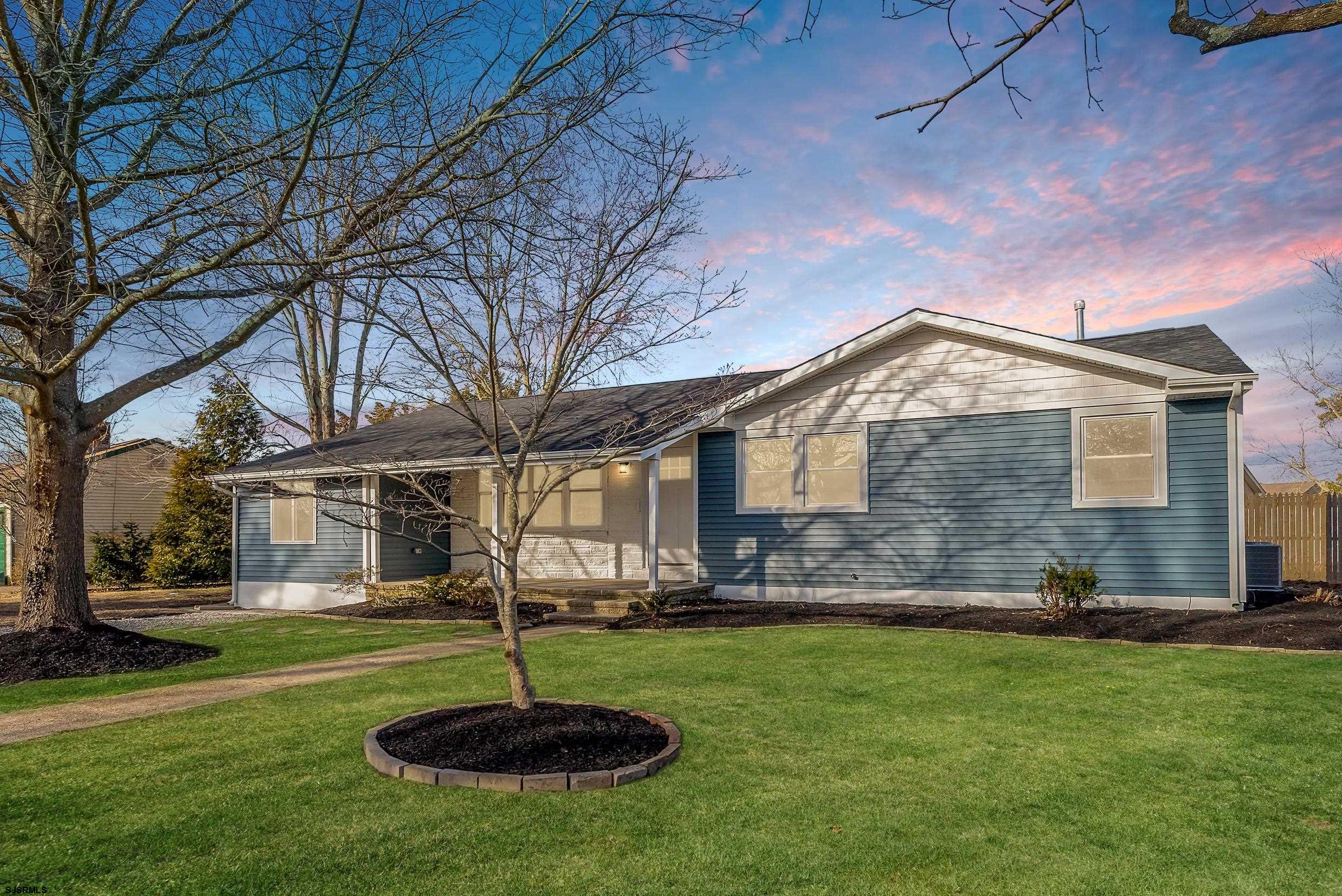 Step into this stunning, fully renovated 4-bedroom, 2-bathroom showstopper! With a brand-new roof, siding, windows, flooring, high efficiency HVAC system, modern light fixtures, and gorgeous modern bathrooms, this home feels like brand-new. The open-concept layout, paired with a cutting-edge kitchen featuring new stainless steel appliances, modern cabinetry, granite countertops, and a stylish backsplash, sets the stage for both style and convenience. Outside, indulge in a generously-sized yard—perfect for entertaining, letting the pups run around, or simply kicking back in ultimate privacy. Located in the desirable Northfield area, you’re just minutes from the heart of Central Square in Linwood, Birch Grove Park, nature trails, and an endless list of amazing dining, shopping, and local hotspots. Oh, and the Jersey Shore’s iconic Ocean City boardwalk and beach? Less than 15 minutes away! With easy Parkway access, day trips to Cape May and beautiful shore destinations are a breeze! This isn’t just a home, it’s a lifestyle. Ready to move in, no detail overlooked, and in the most amazing location to enjoy summers near the beaches. Don’t wait—schedule your showing today!