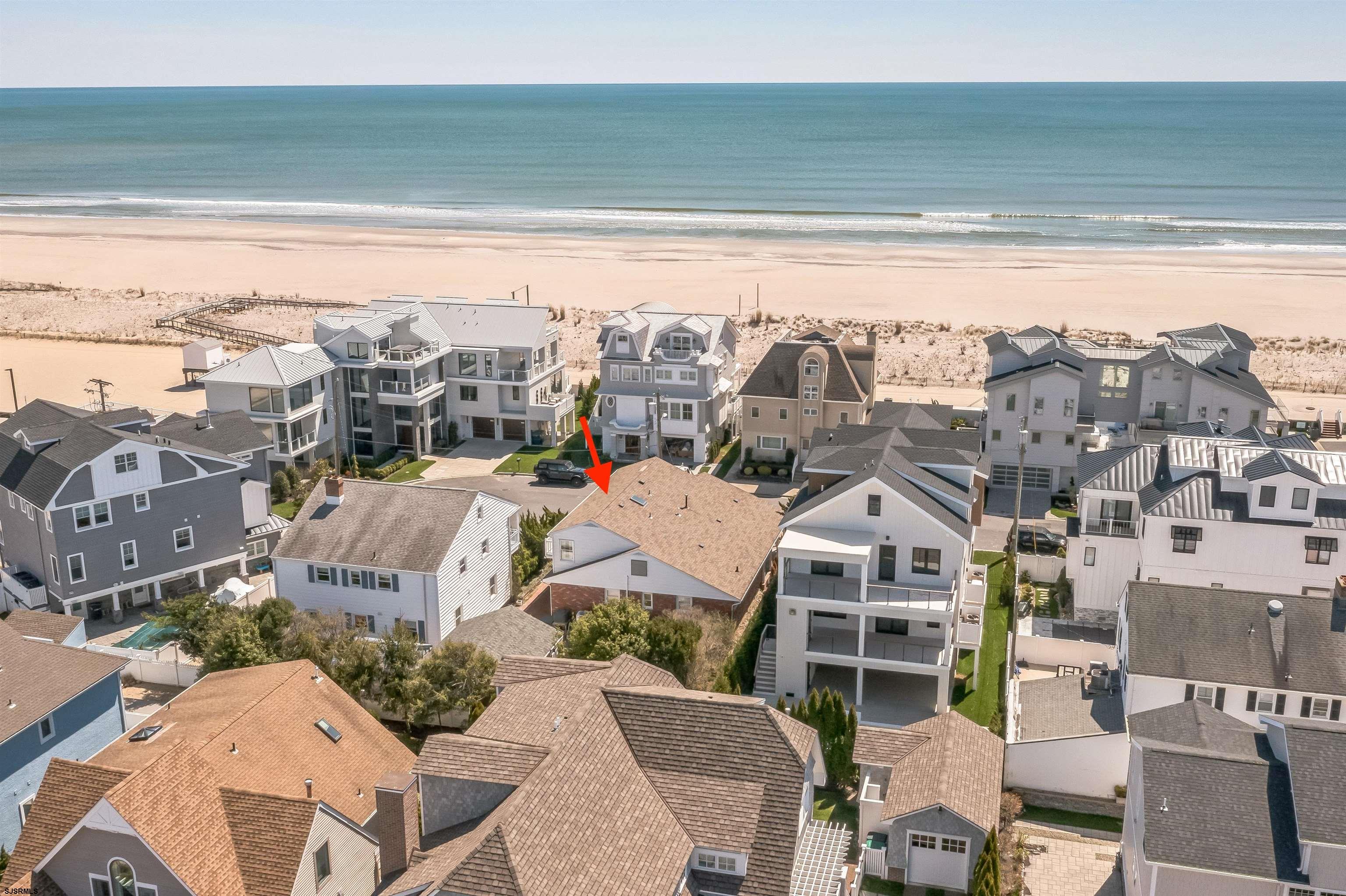 LARGEST MARGATE BEACH BLOCK LOT ON THE MARKET – NEARLY TWICE THE SIZE OF CURRENT LISTINGS! Unparalleled direct ocean views on the ONLY true beach block cul-de-sac in all of Margate City and Absecon Island! This secluded 6-bedroom, 3-bathroom home sits on an extraordinary 50’ x 115’ lot, offering an exclusive and private beachfront experience. If you’re looking for a home with character and longevity, this classic mid-century beauty has stood strong for 66 years, lovingly maintained by the same family for six decades. Features include a new roof, HVAC, garage doors, windows, fresh paint, a remodeled kitchen, and a resurfaced balcony deck with new sliders from the spacious master suite. A dedicated laundry room provides easy beach clean-up, while off-street parking for up to six cars is a rare find on a beach block. This home is within walking distance of the Margate Library, Pavilion, park, playground, restaurants, shops, banks, and more. The formal dining room and oversized living room create a perfect flow for entertaining, and the secluded backyard—with lush landscaping—has hosted everything from intimate gatherings to a wedding reception for 50 guests. The detached oversized garage offers major flexibility and could be converted into an in-law suite, office, pool house, rec room, or entertainment space. Property is in the "circle of millionaires"—a rare find with unmatched lot size and location! Don’t miss this prime, one-of-a-kind opportunity in Margate—act now to make it yours for summer!
