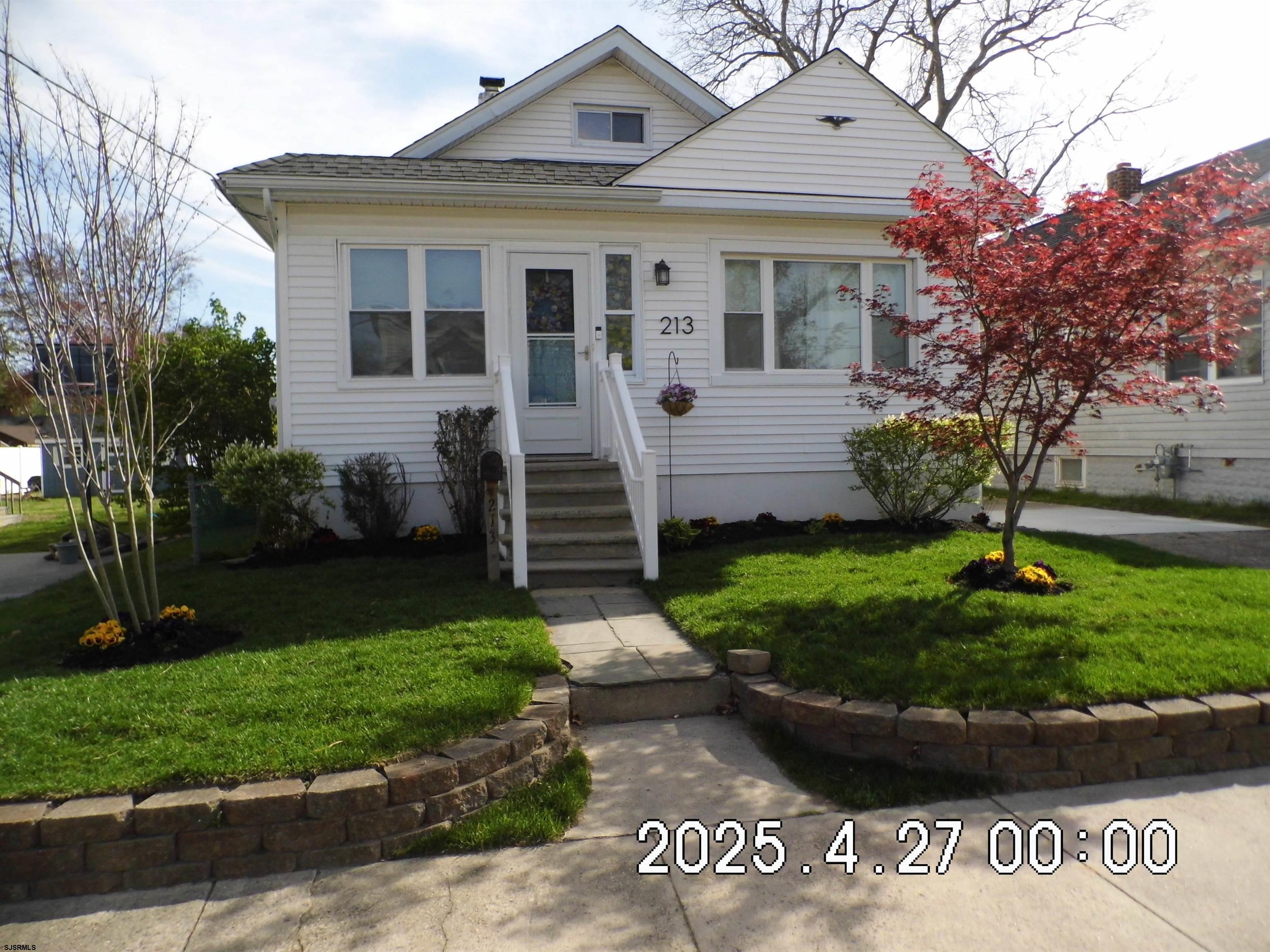 Move in ready single family home that features a large living area with a gas fireplace.  Newer kitchen, windows, heater and hot water heater, a huge upper floor bedroom, full dry unfinished basement with washer and dryer, and a nice patio area out back in the fenced in yard.  Bring your puppy!  Also the garage is over sized, ideal for a contractor or other small business storage.