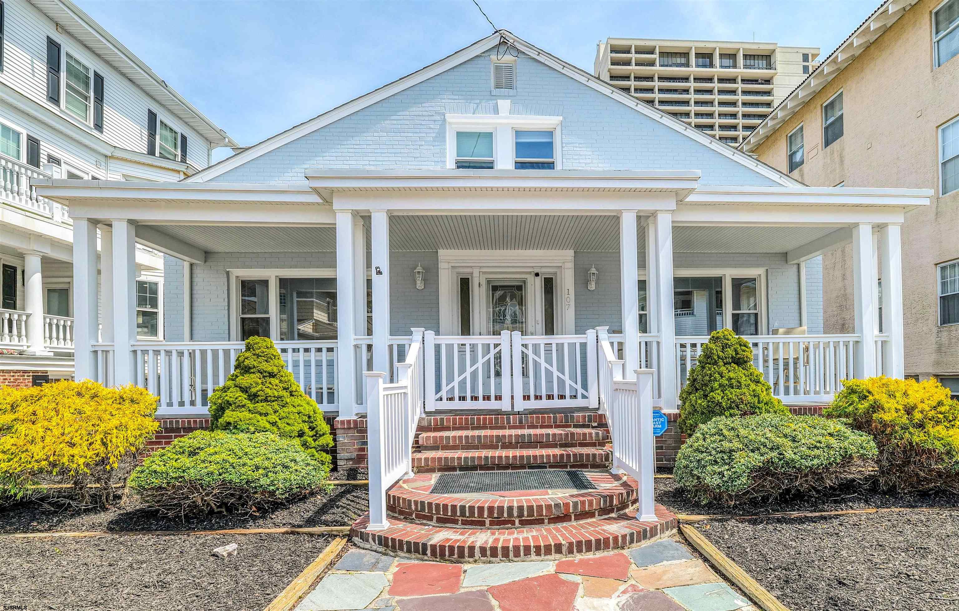 Welcome to this extraordinary oversized ranch home in Lower Chelsea, just the third property from the beach, offering over 2,400 square feet of beautifully maintained living space. The open floor plan seamlessly blends the living room, dining area, and gourmet kitchen, featuring hardwood flooring throughout, a breakfast bar, two walk-in pantries, upgraded cabinets with under-cabinet lighting, and ample space for entertaining. The first floor boasts two large bedrooms, including an owner’s ensuite, a second full bath, and a spacious utility room with extra cabinetry and a stainless steel sink. Upstairs, you'll find two more bedrooms, another full bath, and a third bedroom that opens onto an oversized deck with ocean views. This meticulously cared-for home includes a new roof, two-zoned air conditioning, a tankless water heater, recent renovations such as fresh paint inside and out, and updated windows. Outdoor living is equally impressive, with a slate-covered front patio perfect for watching sunsets, a large backyard ideal for gatherings, an outdoor shower with hot and cold water, a full garage, and driveway parking for at least four cars. Best of all, this incredible property is just moments from the beach and boardwalk and close to top nightlife, entertainment venues, restaurants, and shopping destinations.
