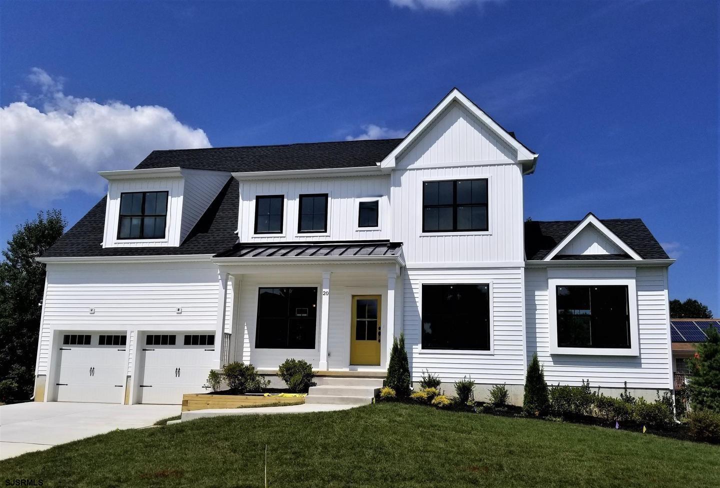 Welcome 20 Monet Drive, a 5 year young beautiful Hampton Model within the highly desired  development of Glen Eyre.  The contemporary elevation is designed with a beautiful open floor plan that reflects what today’s homebuyers truly want. This stunning 4 bedroom / 2.5 bath home features a formal living room and dining room, each adorned by the elegant hardwood flooring that spans throughout the first floor.  A bright and airy sunroom with a cathedral ceiling is drenched in light, the perfect space to relax or entertain  The gourmet kitchen is a chef’s dream, complete with 42" cabinets, quartz countertops, a center island, a farmhouse-style sink, and a pot filler conveniently located over the range. You'll also enjoy upgraded stainless steel appliances.  The great room is expansive and provides the fireplace, with a soaring ceiling and a floor to ceiling wall of windows, highlighting the dramatic elevation.  The convenient main floor laundry offers plenty of space and cabinetry for storage, and is set aside from the inside access of the large 2 car garage.  The main floor living is completed by a 2-piece powder room.  On the upper floor is a primary suite that is spacious with a tray ceiling, 2 closets including a large walk-in, sitting / dressing area and primary bath. This space offers the double vanity with granite counters and a sizable walk in shower, plus a private water closet.  Three spacious secondary bedrooms, ( one also includes its own walk-in!); and a three piece hall bathroom with tile surround and floors complete this level of the newer home!! The backyard is a perfect place for the summer BBQ’s and playtime as you enjoy the newer composite decking.  A full unfinished basement is waiting for the imagination of a new owner and is perfect for future expansion.  This home also offers smart, energy-efficient features like a tankless gas hot water heater, natural gas range, high-efficiency heating and cooling, and a "smart home" tech package — including a Wi-Fi-enabled doorbell, thermostat, keyless front entry, and low-voltage wiring for enhanced connectivity. A new home owner will benefit from the balance of the builder warranty. Convenient to the AC Expressway, Rt 40 for easy city to shore travel, and plenty of shopping this home will not last long!!