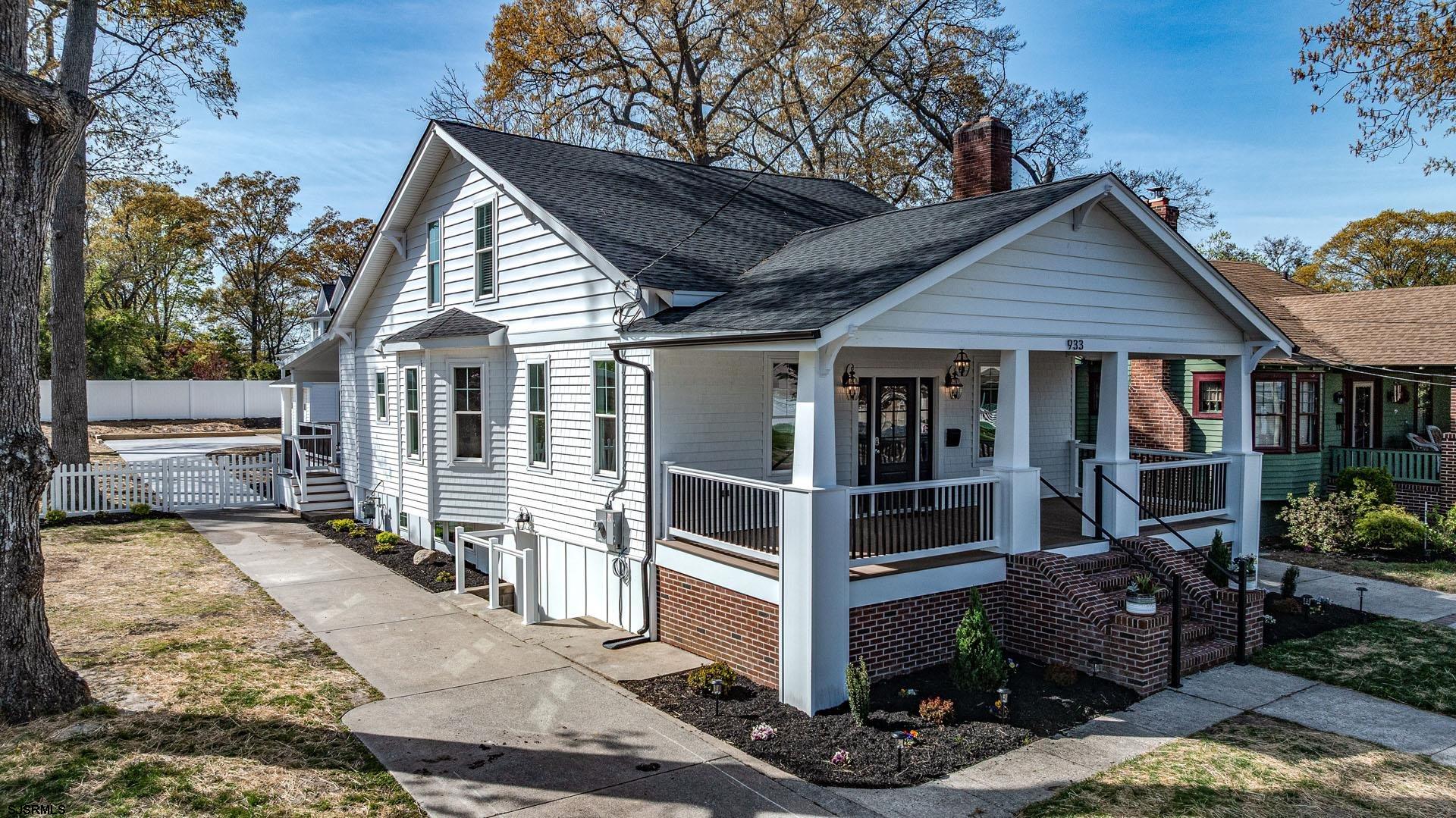 WHERE CONTEMPORARY CLASS & SOPHISTICATED CHARM COLLIDE .. YOU'LL NOT WANT TO MISS THIS COMPLETELY & NEWLY RENOVATED STUNNER LOCATED IN SOUGHT AFTER LINWOOD! SITUATED ON JUST SHY OF A 200' DEEP LOT, YOU'LL BE GREETED WITH A HUGE, WELCOMING COVERED FRONT PORCH THAT WOULD MAKE A SOUTHERNER BLUSH. SASHAY ACROSS IT'S 7" EUROPEAN WHITE OAK FLOORING, BUILT-IN SLEEK GAS FIREPLACE, SHIPLAP LIVING ROOM ACCENT WALL WITH CUSTOM CABINETRY, I-PAD DOCKING STATION, FROM WHICH YOU'RE ABLE TO NOT ONLY CONTROL LIGHTING & THERMOSTATS, BUT ALSO YOUR SURROUND SOUND SYSTEM, A PERFECT ADDITION TO EVERYDAY CONVENIENCE & HOLIDAY ENTERTAINING! THE GOURMET KITCHEN BOASTS ULTRACRAFT CUSTOM CABINETRY, FANTASY BROWN GRANITE COUNTERTOPS WITH INFINITY WATERFALL EDGE, POT FILLER, & BOSCH "800 SERIES" STAINLESS APPLIANCES. INSIDE THE 1ST FLOOR MASTER SUITE YOU'LL FIND CUSTOM BUILT IN CLOSETS, A STUNNINGLY ELEGANT BATH & BREATHTAKING VIEW OF YOUR OWN PRIVATE BACKYARD OASIS. WITH 5 PIECE CROWN MOULDING ON ALL NEW WINDOWS & DOORS & WALLCHIERE SCONCE LIGHTING THROUGHOUT, NOT A DETAIL WAS IGNORED WHEN DESIGNING THIS ONE! 4 LARGE ADDITIONAL SPARE BEDROOMS & 3 ADDITIONAL SPACIOUS BATHS COMPLIMENT THE MASTER SUITE, & ARE DIVIDED AMONGST ALL 3 FLOORS, GIVING YOU AMPLE PRIVACY AS WELL AS THE ABILITY TO HOST LARGE FAMILY & FRIEND GATHERINGS! AND, WITH 2 LAUNDRY ROOMS, YOU'LL FIND HOUSEHOLD CHORES A BREEZE. THE LOWER LEVEL INCLUDES A LARGE ENTERTAINMENT AREA WITH DRY BAR, WINE FRIDGE & CUSTOM CABINETRY AS WELL AS A BONUS ROOM. ENJOY COCKTAILS, COFFEE & BBQS ON YOUR LARGE COVERED REAR DECK WITH WALNUT COLORED COMPOSITE DECKING, OUTDOOR COOKING WALL WITH 42" NATURAL GAS GRILL & SMART TV! THE LARGE 2 & A HALF CAR DETACHED GARAGE SEAMLESSLY MARRIES THE REAR OF THE HOME BY A GORGEOUS WHITE TRAVERTINE MARBLE TILE PATIO WITH NATURAL GAS FIRE PIT, ALL TIED TOGETHER WITHIN WHITE VINYL FENCING FOR BOTH PEACE OF MIND & ENJOYMENT. WE LOOK FORWARD TO HOSTING YOUR OWN PRIVATE TOUR TODAY!