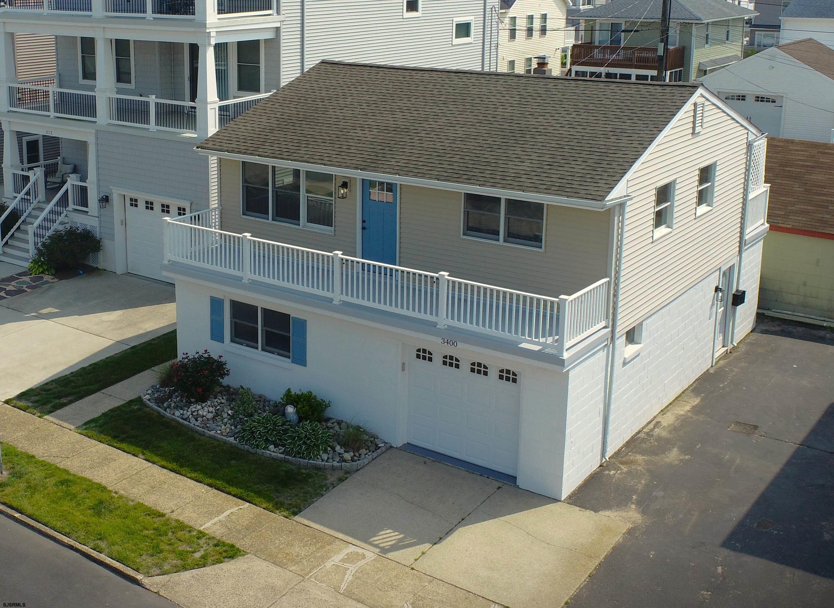 Beach Block Stand Alone Condo in Brigantine! Don't wait on this one! Perfect for a home based business or set up you're own sports bar.. Here's a chance to get a beautifully remodeled 2 bedroom condo that is the only stand alone house of the 5 units in this complex in the Lighthouse District of Brigantine. This is the crown jewel of this condo offering of 5 units and has the feel of a single family home.  Situated on the beach block of 34th street's accessible beach, this cozy condo will make a perfect vacation home and can also be a revenue producing rental that can pay for itself. Beautifully remodeled with modern fixtures and appliances. The brand new central air conditioning system will provide comfort year round. It also includes a 2 car garage/workshop with an office and separate half bathroom that can be used in a multitude of ways.  Call your favorite agent and book your private showing today! This is unit 5 of 5 units being offered. As this is a newly established condo unit, taxes have not been determined and HOA fee is estimated. There will be a $1,000 capital contribution for the HOA. HOA fee covers sewer, water, flood and Hazzard insurance on the structure along with common area maintenance.
