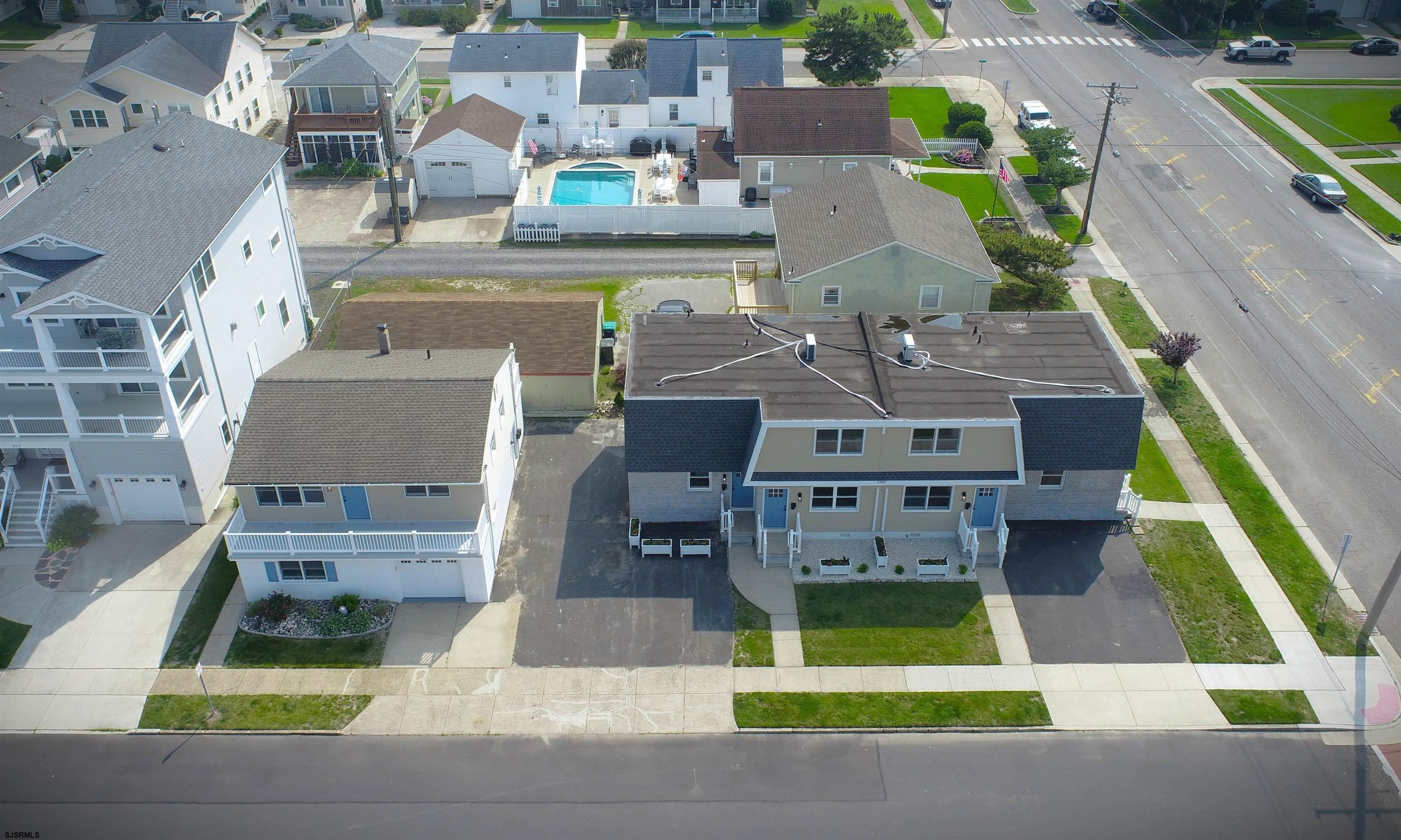 Beach Block Condo Complex in Brigantine!  Don't miss this fantastic investment opportunity to own 5 freshly renovated, 2 bedroom, 1 bathroom units in the Lighthouse District of Brigantine.  Units 1-4 are situated in one building and unit 5 stands on it's own with a large 2 car garage, office and a half bathroom.  Similar units rent for an average of $2,500 weekly during the season and with it's close proximity to AC makes them attractive rental options even in the off season.  The complex was just converted to condos so each one can be sold separately.  Once one unit goes, this package offering will be removed.  Get a hold of your favorite REALTOR and book your showing today!